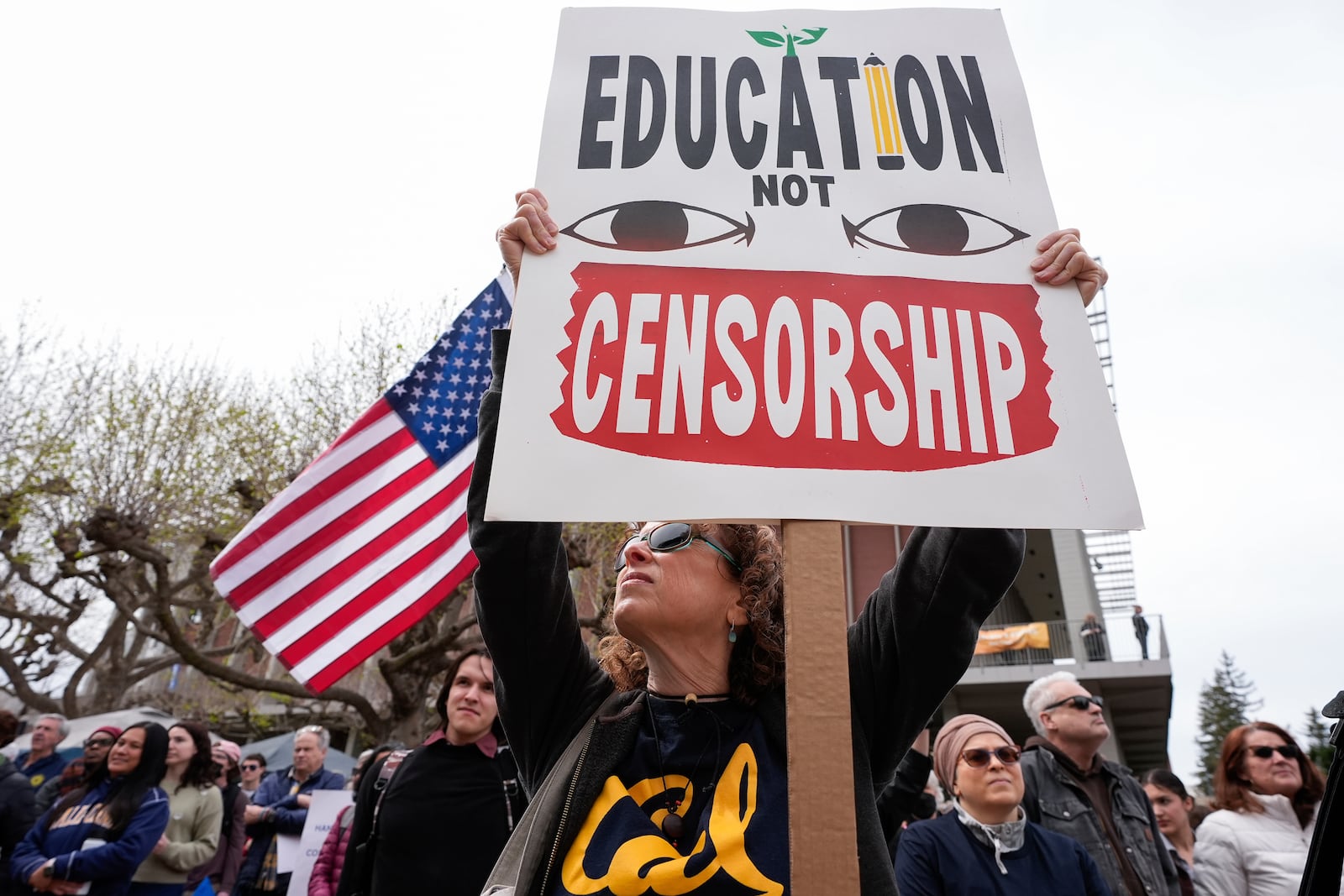 People rally at the University of California, Berkeley campus to protest the Trump administration Wednesday, March 19, 2025, in Berkeley, Calif. (AP Photo/Godofredo A. Vásquez)