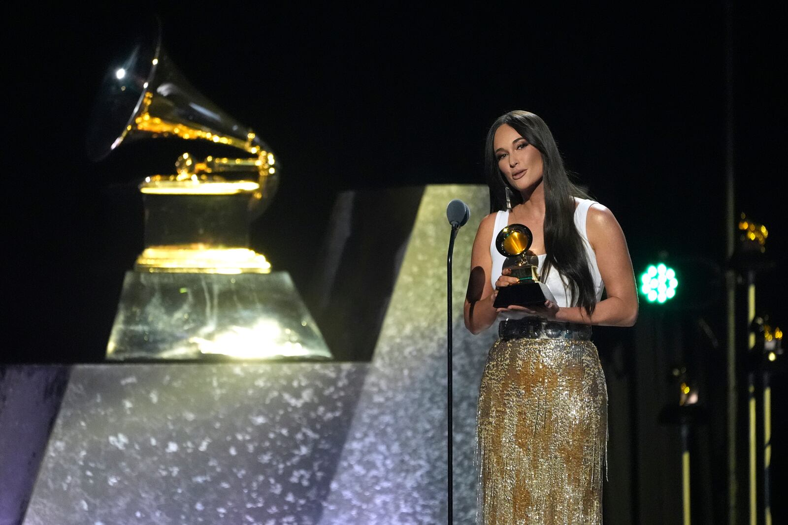 Kacey Musgraves accepts the award for best country song for "The Architect" during the 67th annual Grammy Awards on Sunday, Feb. 2, 2025, in Los Angeles. (AP Photo/Chris Pizzello)