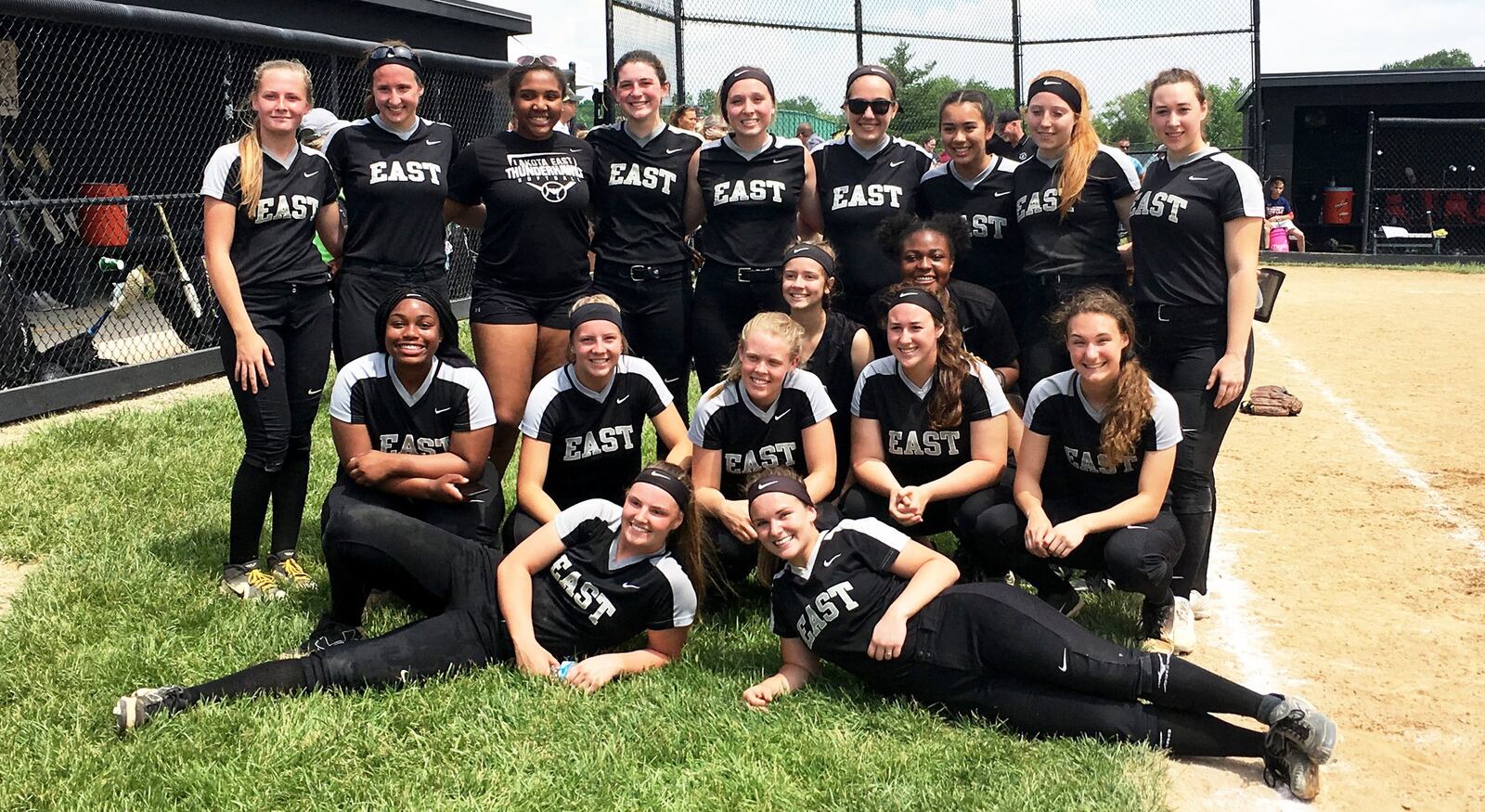 Lakota East’s players pose for a photo Saturday after winning a Division I regional softball championship with a 2-1 triumph over Lakota West at Centerville. RICK CASSANO/STAFF