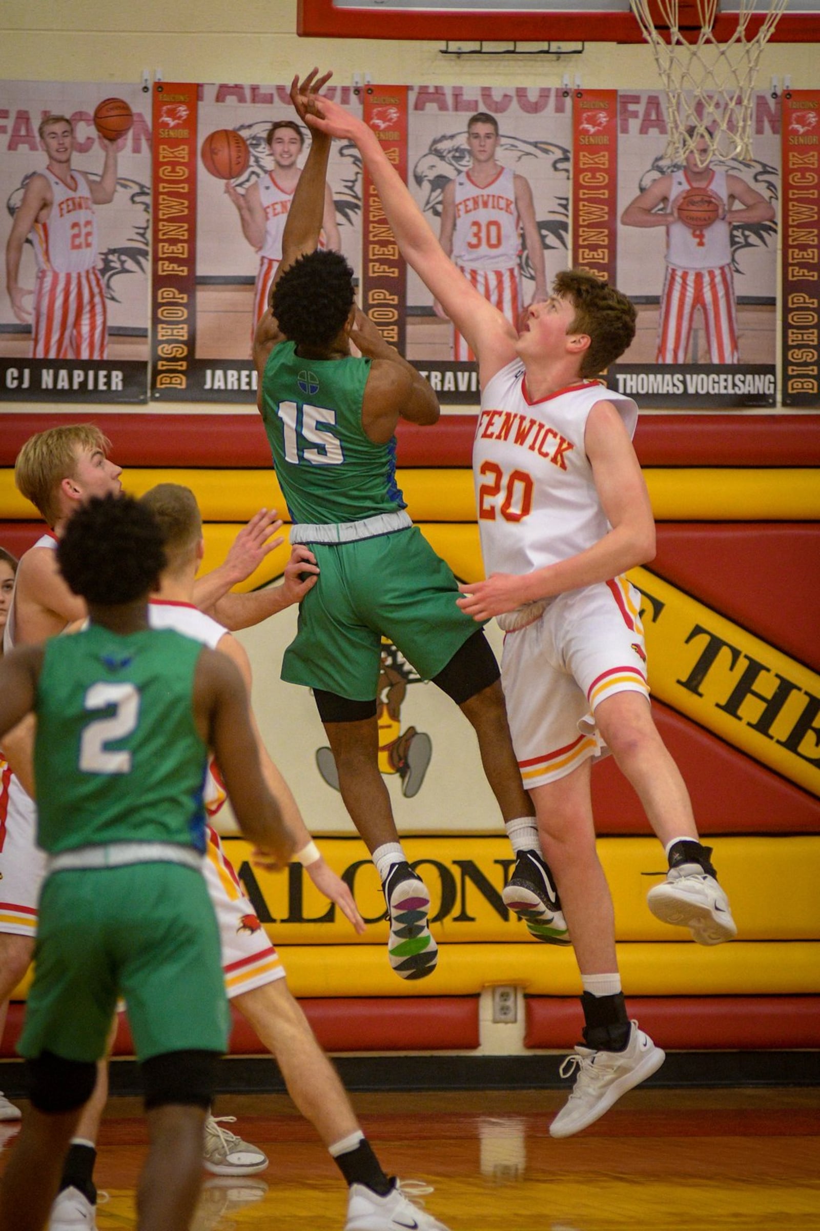 Fenwick’s A.J. Braun goes after a shot by Chaminade Julienne’s Milton Gage (15) during Friday night’s game in Middletown. CJ won 68-63 in double overtime. ROB MCCULLEY/RAM PHOTOGRAPHY