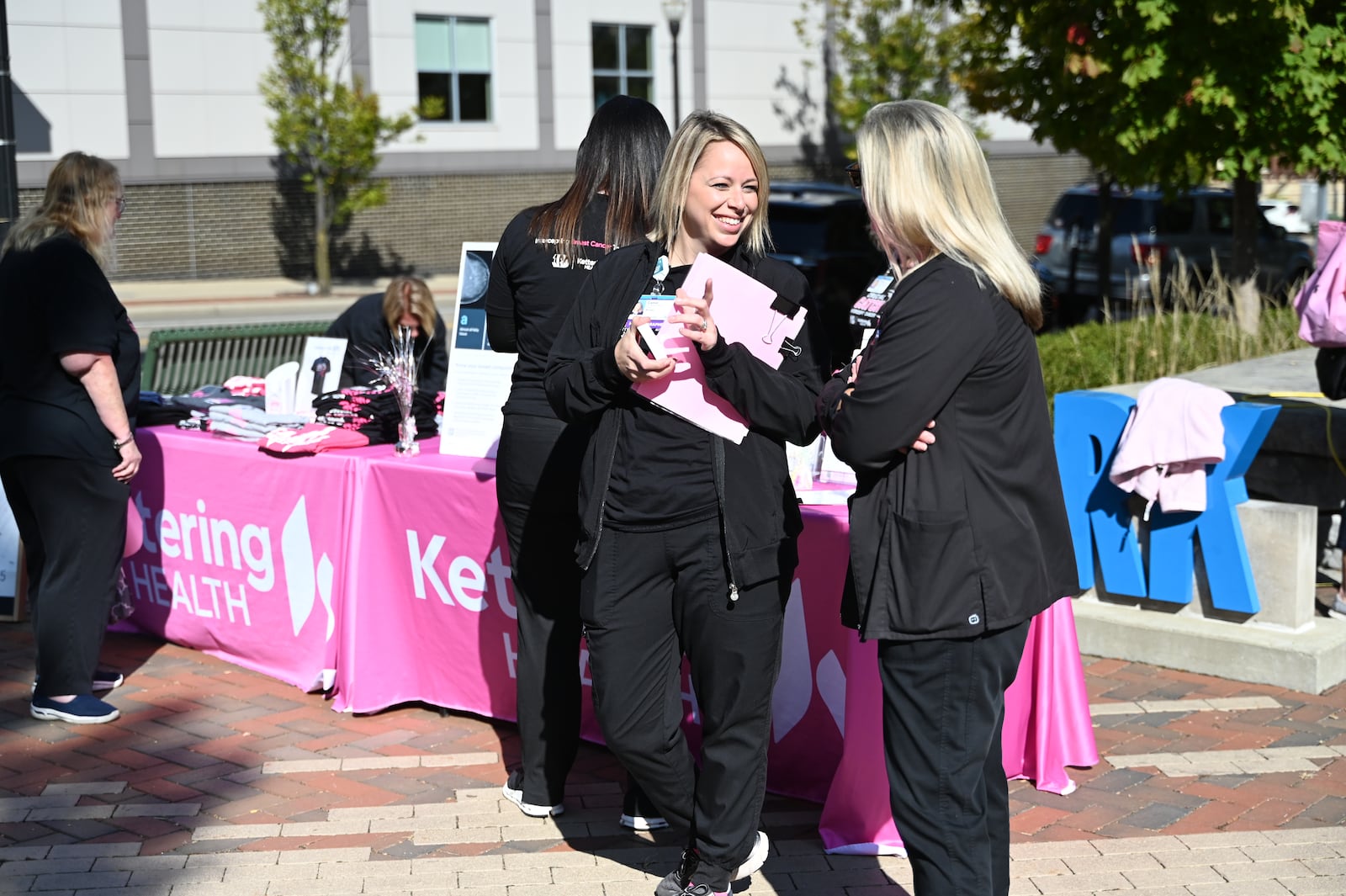 Kettering Health Hamilton hosted its annual Pink Around the Square, a women's health expo at Rotary Park on Friday, Oct. 18, 2024. The free event, which started in 2016, provides information about breast health and to celebrate and honor those affected by breast cancer. MICHAEL D. PITMAN/STAFF