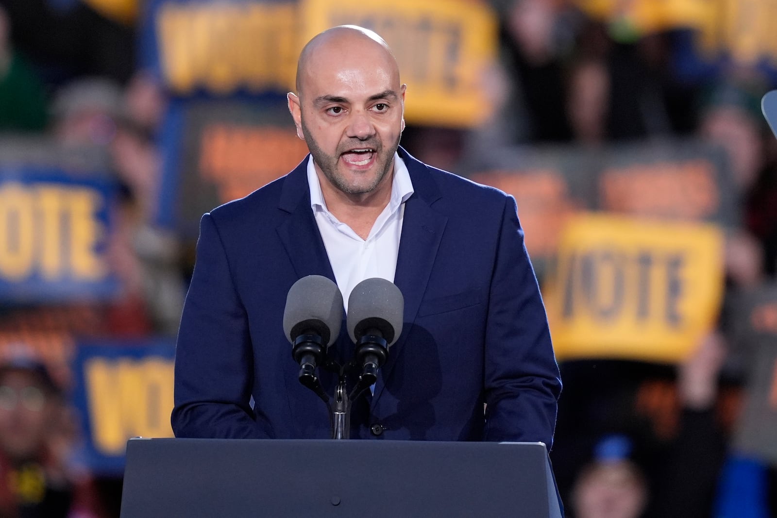 Assad Turfe, of Dearborn, Mich., speaks at a campaign rally for Democratic presidential nominee Vice President Kamala Harris at Burns Park in Ann Arbor, Mich., Monday, Oct. 28, 2024. (AP Photo/Carlos Osorio)