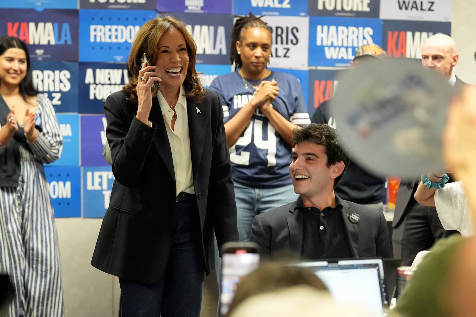 Democratic presidential nominee Vice President Kamala Harris phone banks with volunteers at the DNC headquarters on Election Day, Tuesday, Nov. 5, 2024, in Washington. (AP Photo/Jacquelyn Martin)