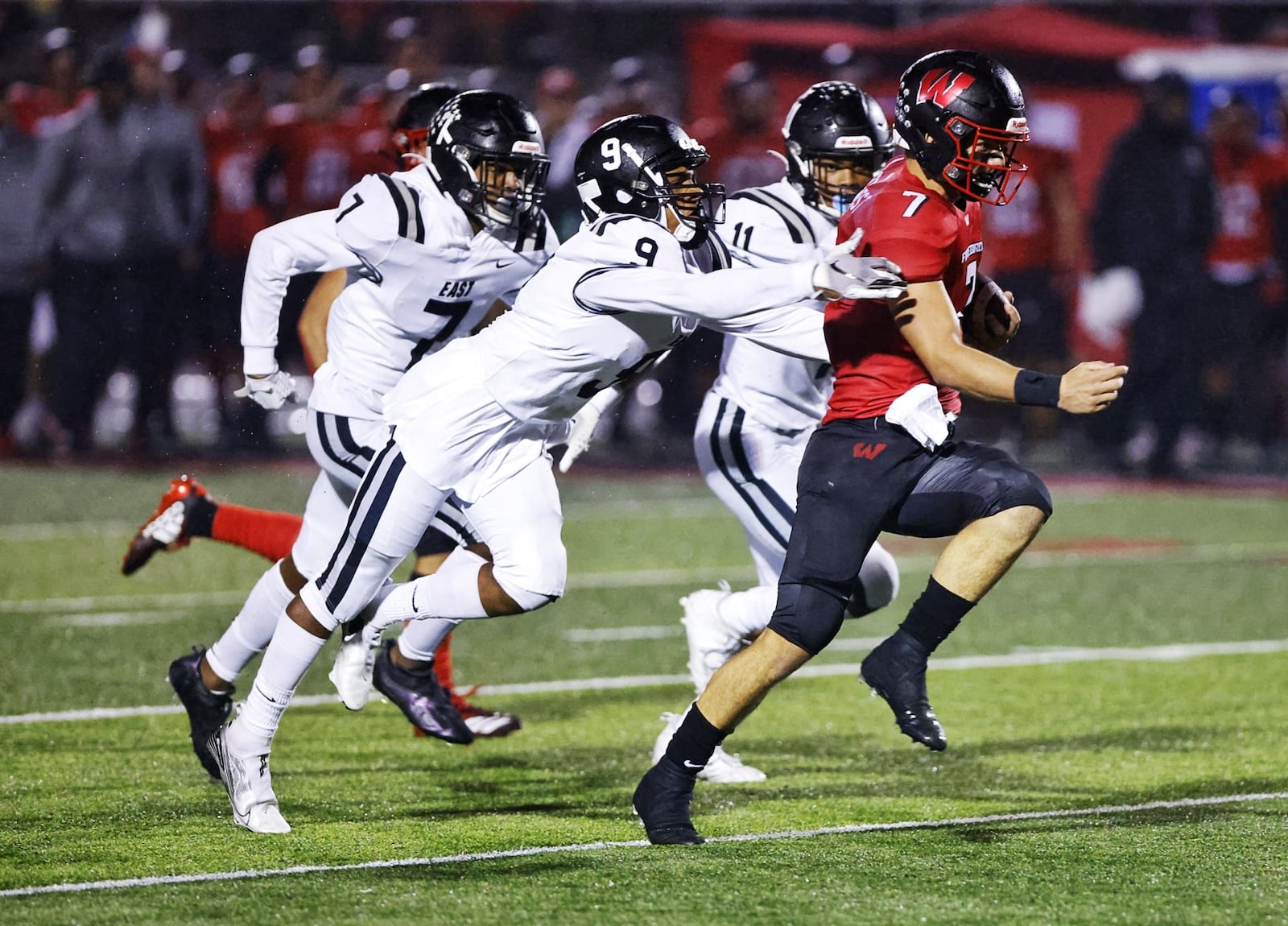 Lakota West quarterback Mitch Bolden carries the football during their 34-7 win over Lakota East Friday, Oct. 22, 2021 at Lakota West High School in West Chester Township. NICK GRAHAM/STAFF