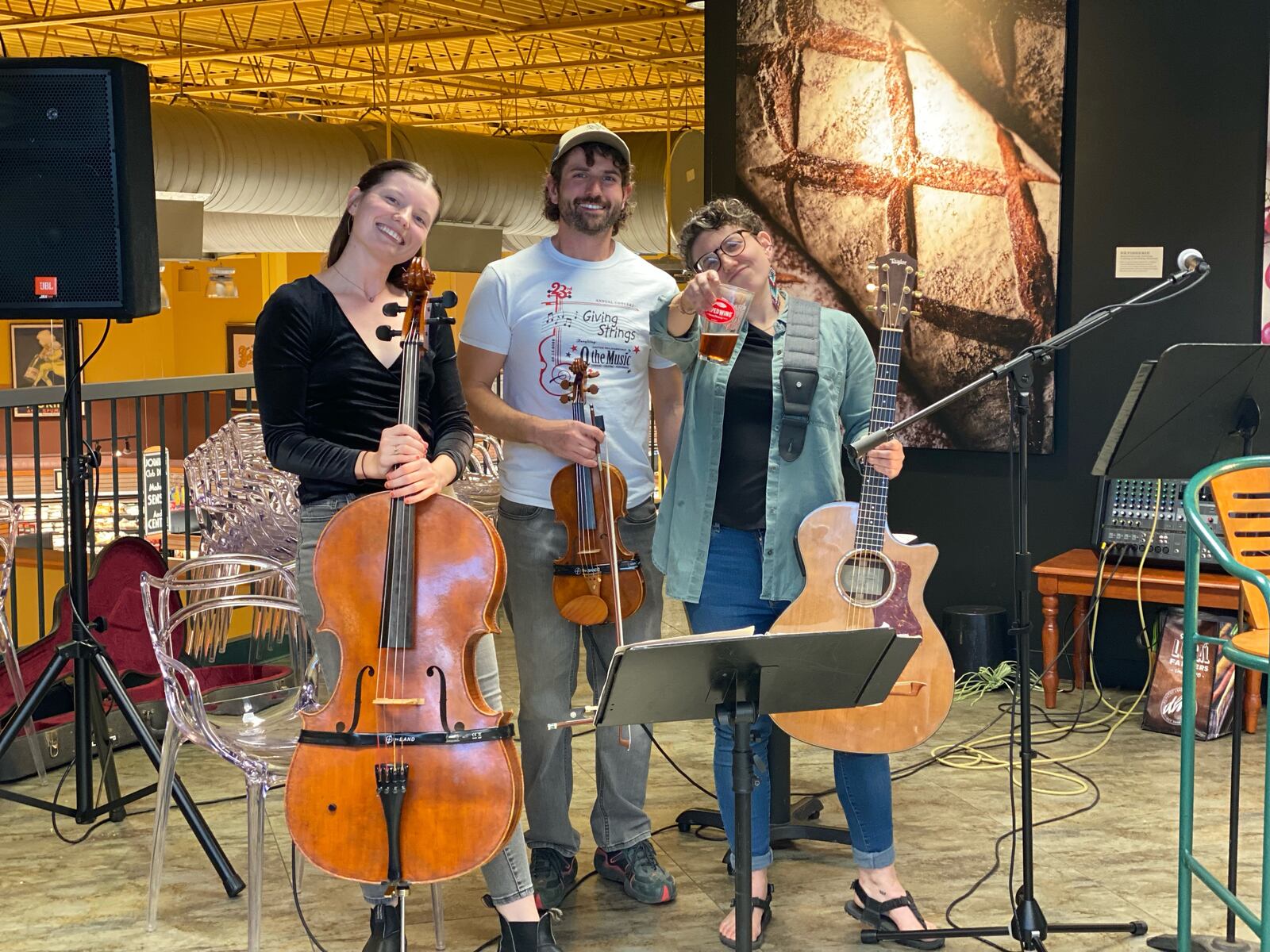 Joel Thompson, owner of Side Door Strings, with his sisters. They grew up in a musical family and often play together. Thompson plays cello, violin, fiddle, and viola da gamba, a Baroque instrument.