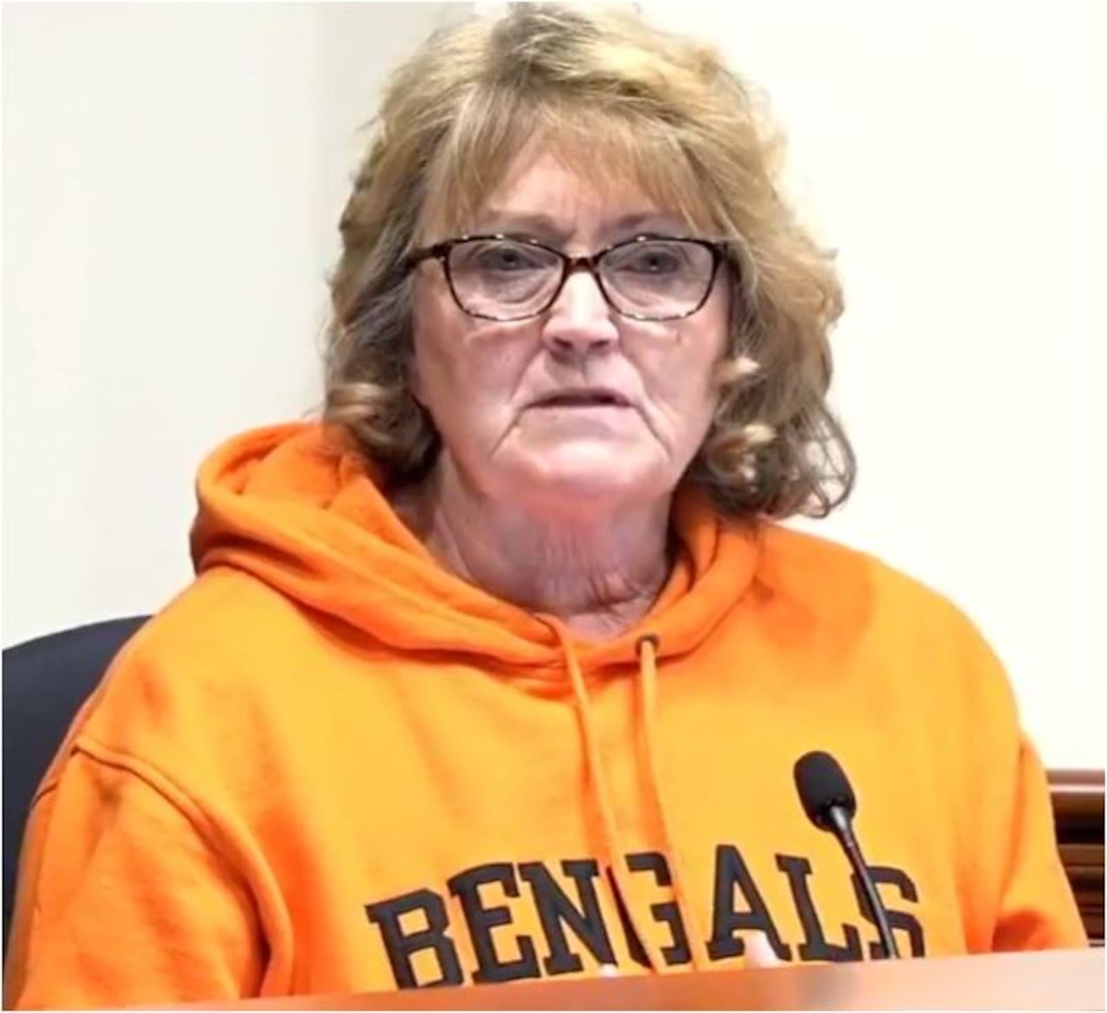 Hamilton Council Member Carla Fiehrer wore a Bengals hoodie to Wednesday's City Council meeting. If the team makes the Super Bowl, Hamilton likely will declare a name in the Bengals' honor. MIKE RUTLEDGE/STAFF