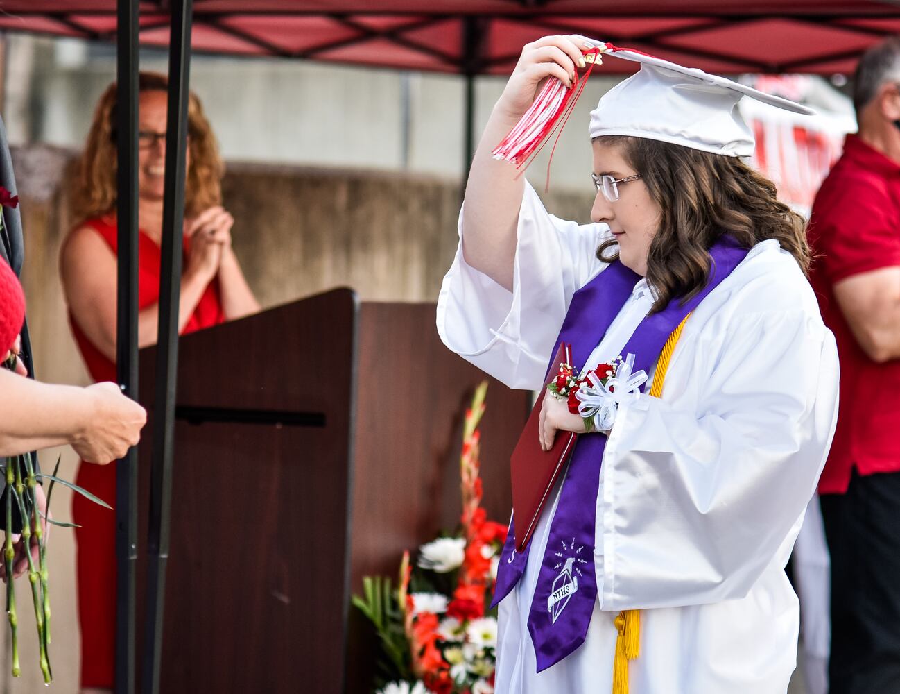 Madison High School drive-thru graduation ceremony at Land of Illusion