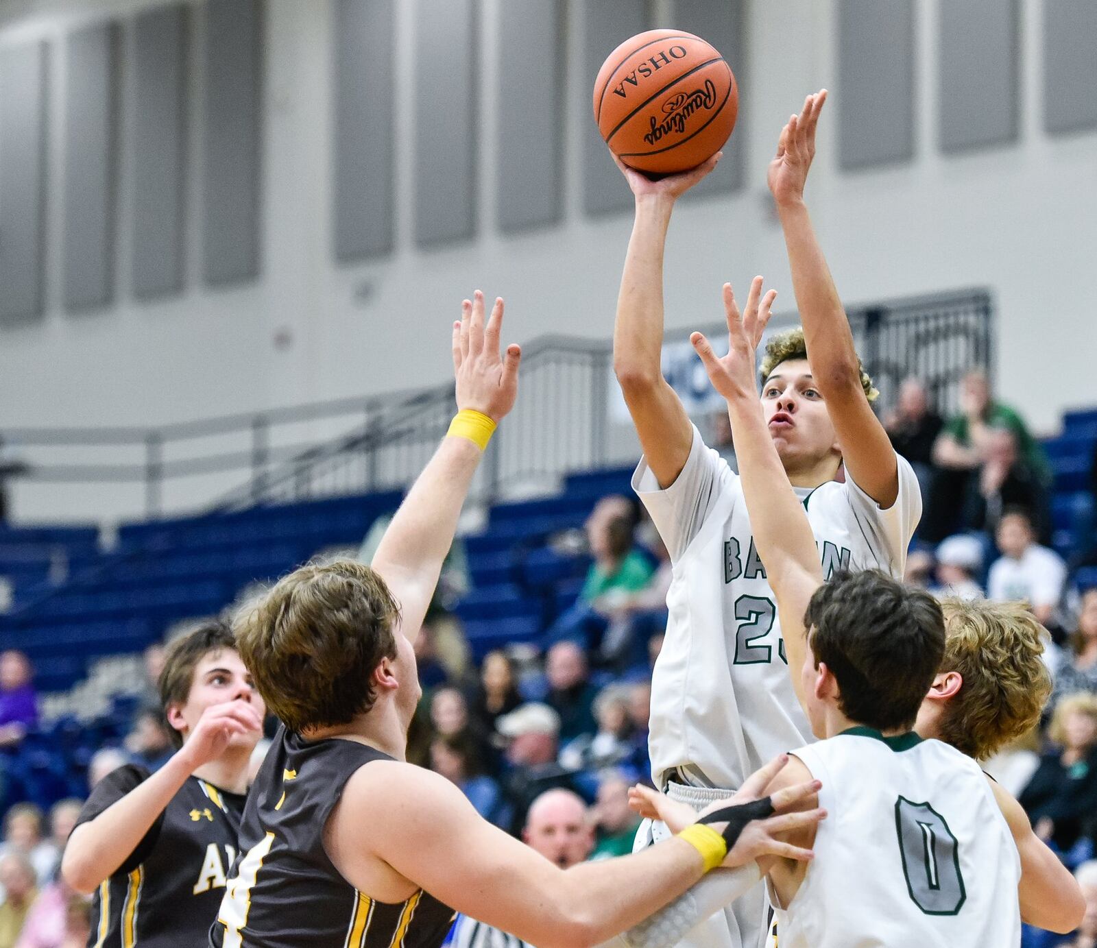 Badin’s Caleb Meyer puts up a shot during Tuesday night’s Division II sectional semifinal against Alter at Fairmont’s Trent Arena. NICK GRAHAM/STAFF