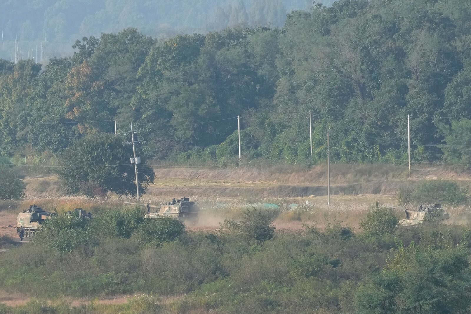 South Korean army K-9 self-propelled howitzers move in Paju, South Korea, near the border with North Korea, Thursday, Oct. 17, 2024. (AP Photo/Ahn Young-joon)