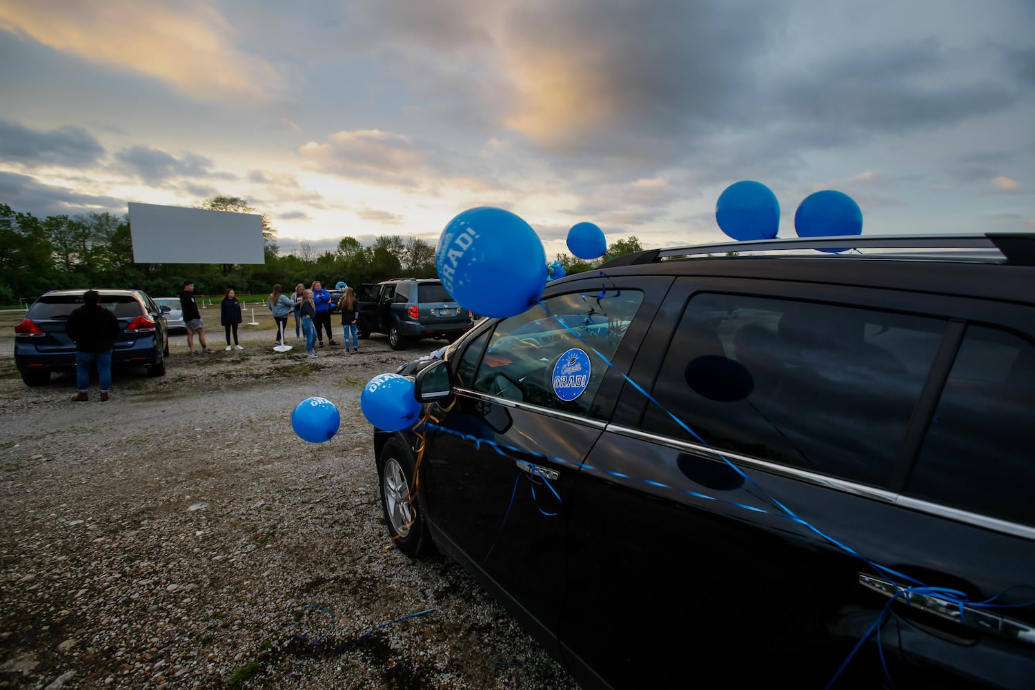 Hamilton High School seniors celebrate graduation at Holiday Auto Theatre drive-in