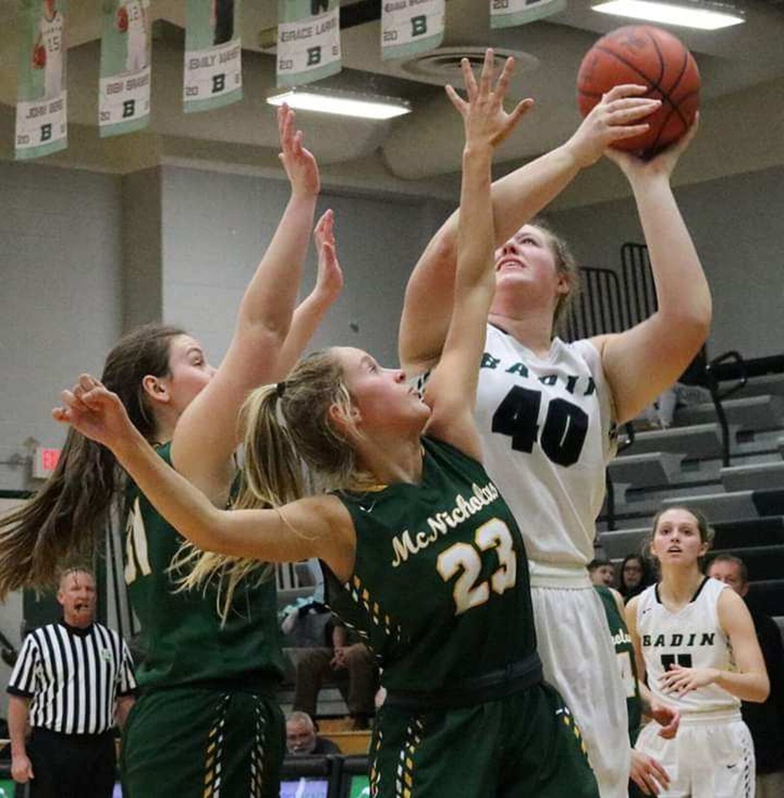 Badin’s Emma Broermann (40) shoots over Christina Poole (23) and Maggie Schoolfield (31) of McNicholas during Wednesday night’s game at Mulcahey Gym in Hamilton. McNick won 53-51. CONTRIBUTED PHOTO BY TERRI ADAMS