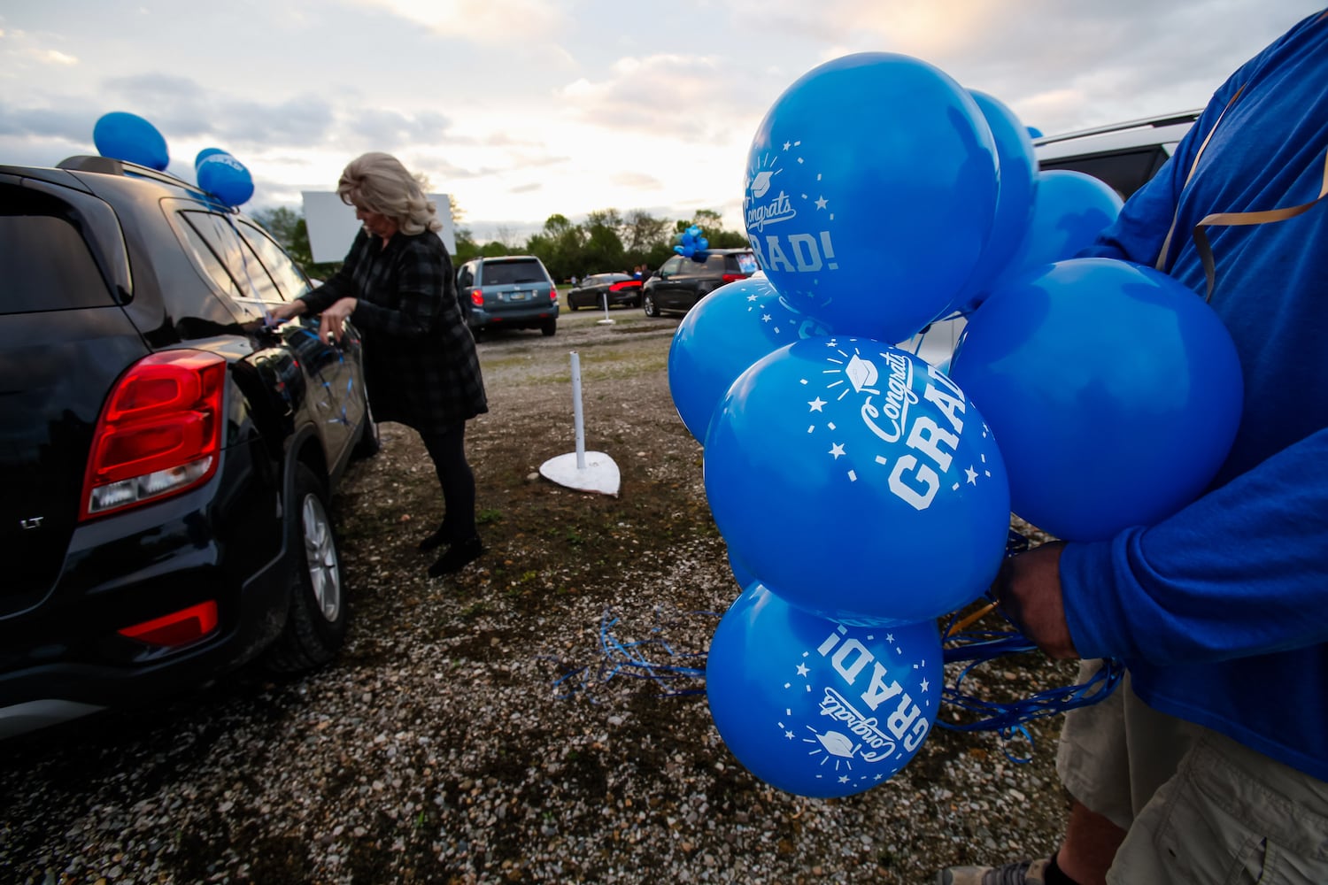 Hamilton High School seniors celebrate graduation at Holiday Auto Theatre drive-in