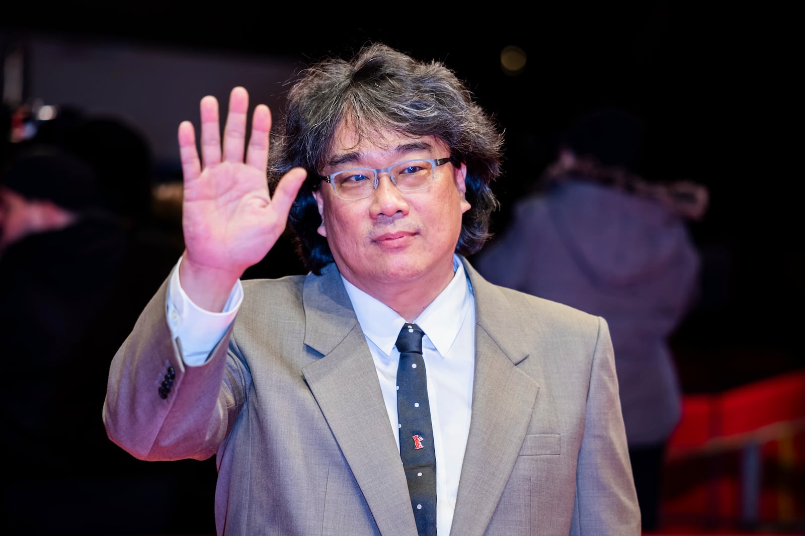 Director Bong Joon-ho poses for the photographers as he arrives for the screening of the film 'Mickey 17' at the International Film Festival, Berlinale, in Berlin, Saturday, Feb. 15, 2025. (Christoph Soeder/dpa via AP)