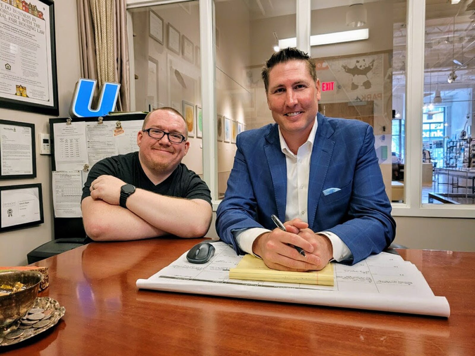 Jay Kidd, curator of the "Decked" art exhibit and property manager of the Artspace Lofts, is seen with David Stark, founding executive director of The Strauss Gallery and Gift Shop and also an Artspace manager. CONTRIBUTED