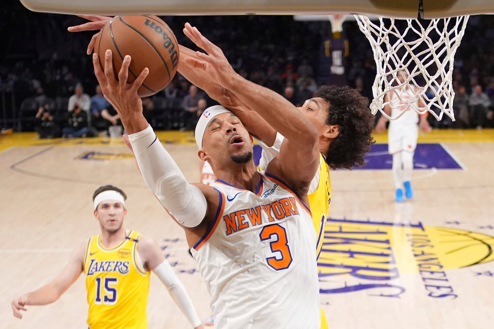 New York Knicks guard Josh Hart (3) shoots as Los Angeles Lakers center Jaxson Hayes (11) defends during the first half of an NBA basketball game Thursday, March 6, 2025, in Los Angeles. (AP Photo/Mark J. Terrill)