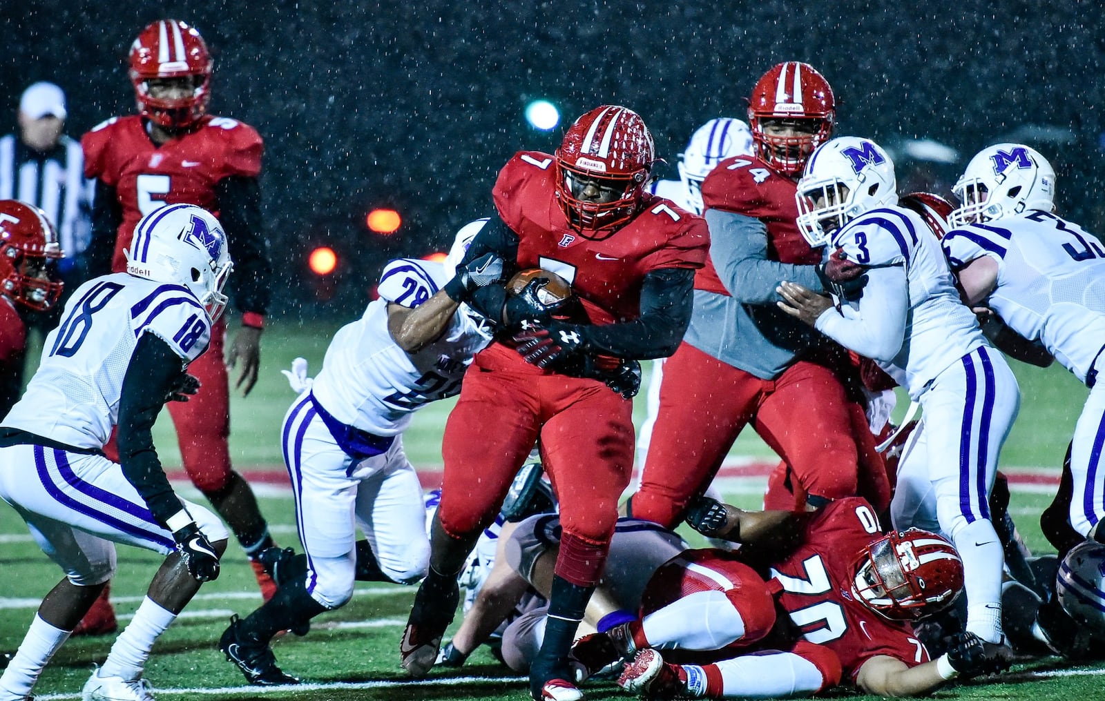 Fairfield’s Malik Vann carries the ball during an Oct. 27 game against Middletown at Fairfield Stadium. The host Indians posted a 48-0 victory. NICK GRAHAM/STAFF