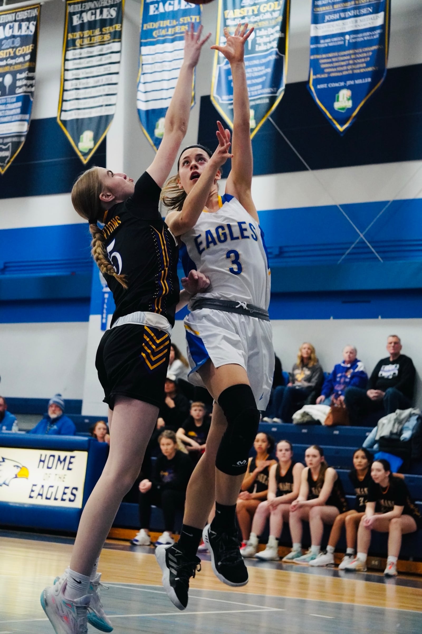 Middletown Christian’s Whitney Schaurer (3) goes up for a shot against Emmanuel Christian earlier this season. Chris Vogt/CONTRIBUTED