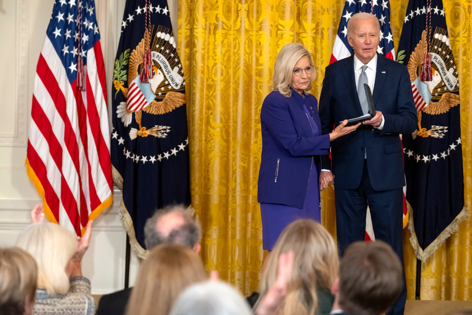 President Joe Biden awards the Presidential Citizens Medal to former Rep. Liz Cheney, R-Wyo., during a ceremony in the East Room at the White House, Thursday, Jan. 2, 2025, in Washington. (AP Photo/Mark Schiefelbein)