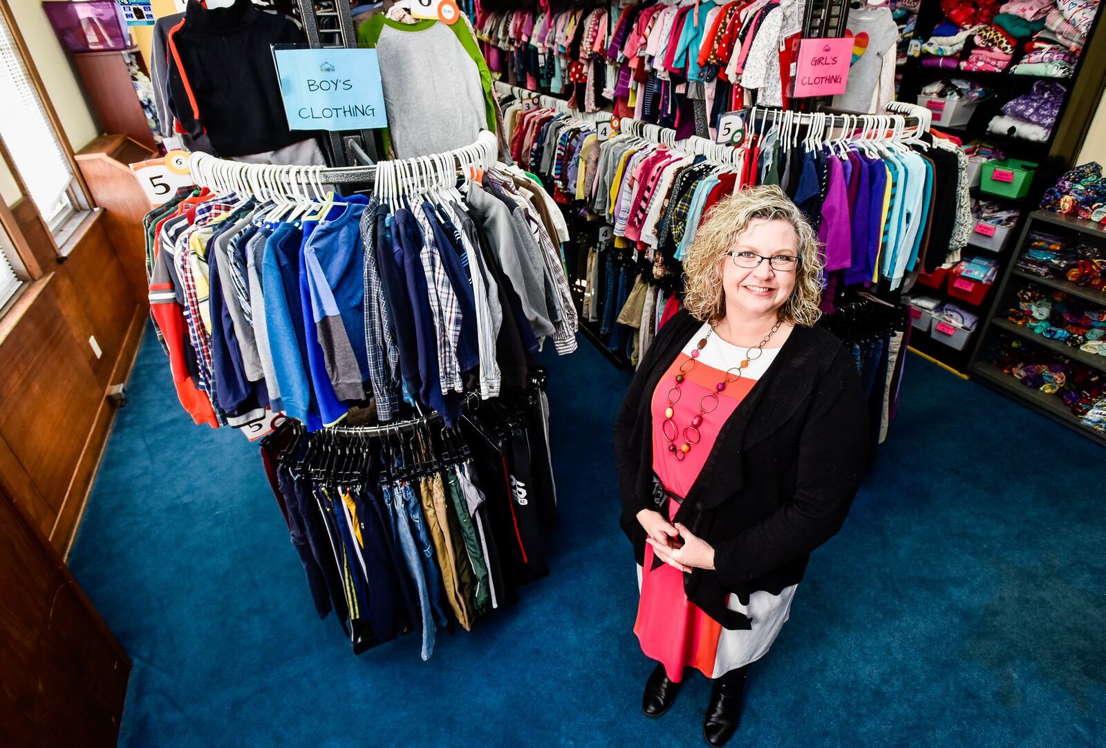 Sarah Coleman, executive director of Hope’s Closet, stands inside their facility Monday, March 11. Hope’s Closet is a foster parent resource providing clothing, training, community support groups and more for foster families in the area. NICK GRAHAM/STAFF