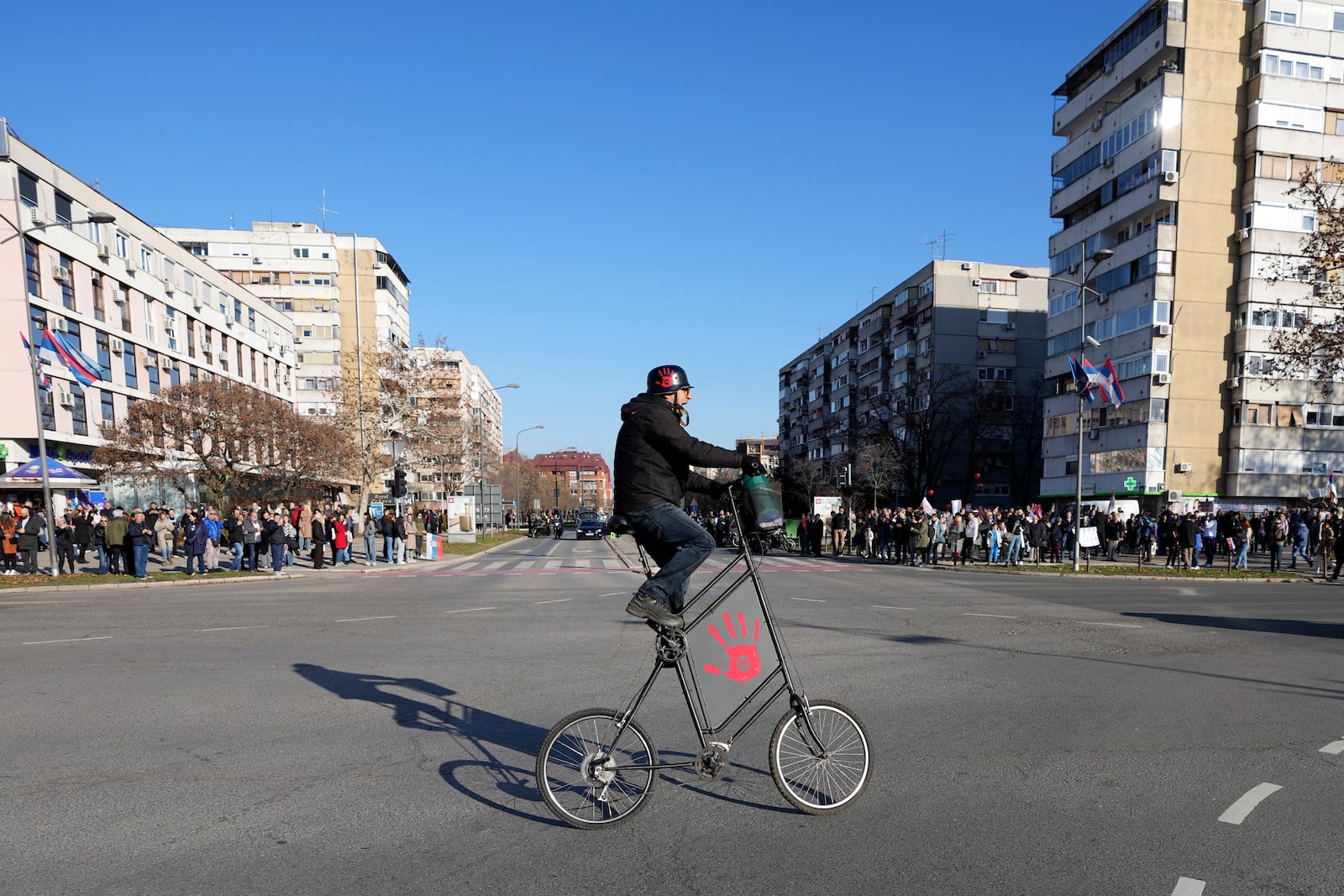 People ride motorcycles during a protest over the collapse of a concrete canopy that killed 15 people more than two months ago, in Novi Sad, Serbia, Saturday, Feb. 1, 2025. (AP Photo/Darko Vojinovic)