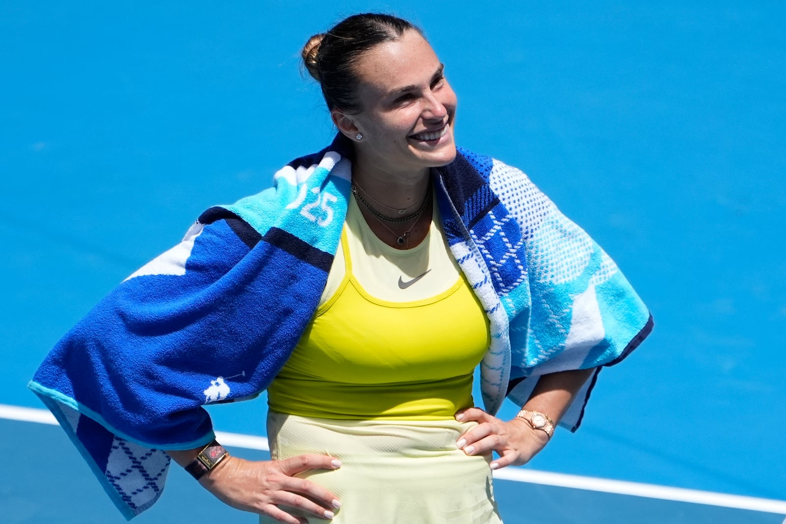 Aryna Sabalenka of Belarus reacts after defeating Mirra Andreeva of Russia in their fourth round match at the Australian Open tennis championship in Melbourne, Australia, Sunday, Jan. 19, 2025. (AP Photo/Asanka Brendon Ratnayake)