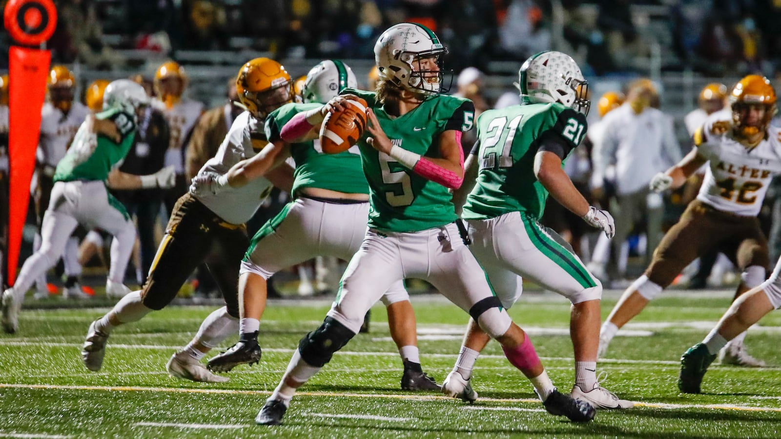 Badin High School quarterback Landyn Vidourek throws a pass 
during their game against Alter on Friday night at Lakota East. The Knights won 20-3. Michael Cooper/CONTRIBUTED