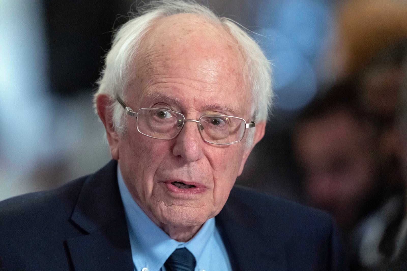 FILE — Sen. Bernie Sanders, I-Vt., talks to the media as he walks to the House chamber before President Joe Biden's State of the Union address at the U.S. Capitol, Thursday, March 7, 2024, in Washington. (AP Photo/Jose Luis Magana, File)