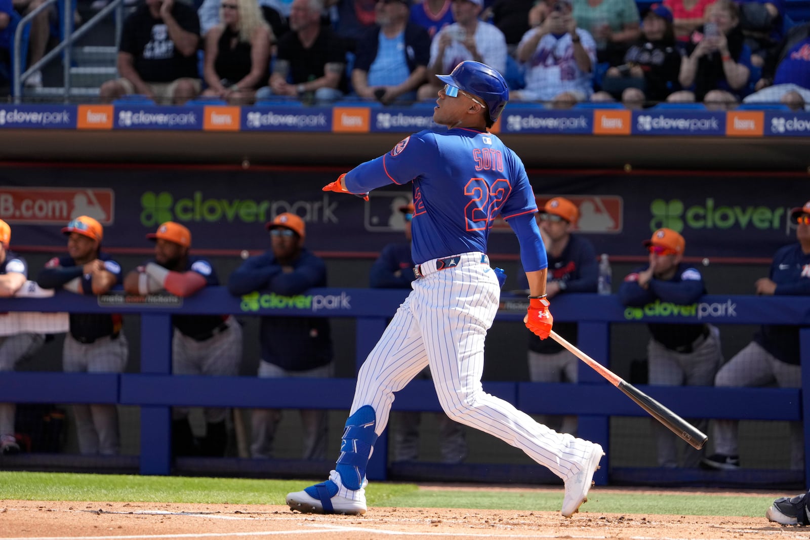 New York Mets' Juan Soto watches his solo home run during the first inning of a spring training baseball game against the Houston Astros Saturday, Feb. 22, 2025, in Port St. Lucie, Fla. (AP Photo/Jeff Roberson)