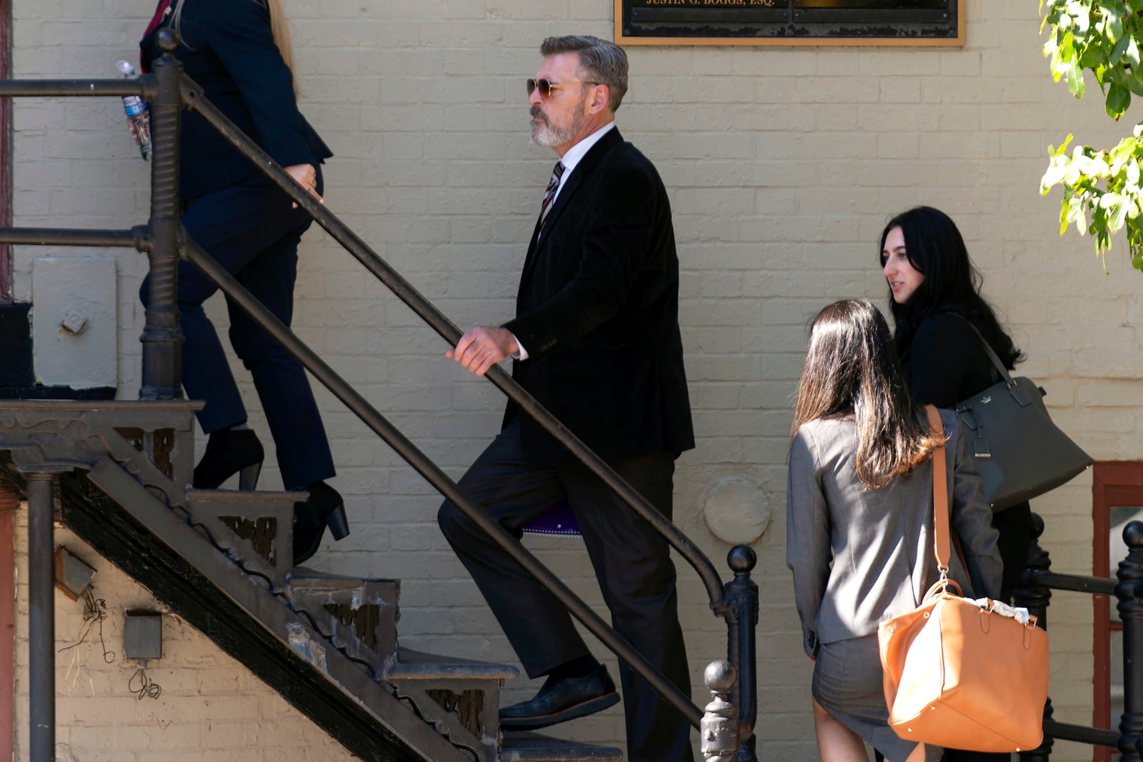 Actor Jay Johnston walks into a building after leaving federal court Monday, Oct. 28, 2024, after he was sentenced to a one year and one day in prison for taking part in the riot at the U.S. Capitol nearly four years ago. (AP Photo/Jose Luis Magana)