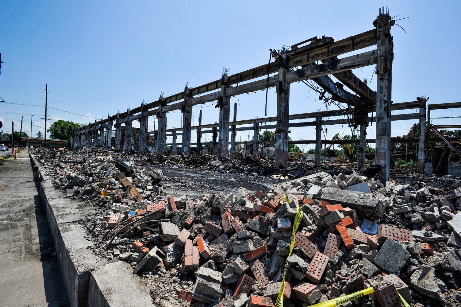 Crews demolish warehouse after massive fire in Hamilton