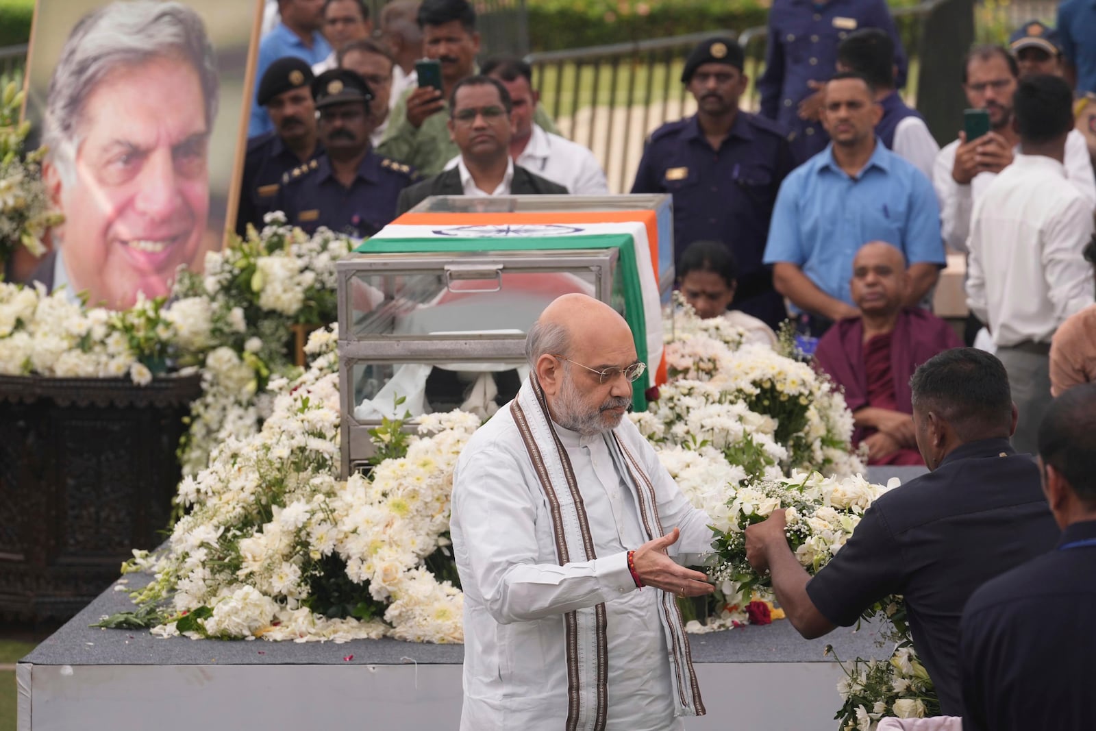 Indian Home Minister Amit Shah pays tributes to Indian business leader Ratan Tata who died on Wednesday night, in Mumbai, India, Thursday, Oct. 10, 2024. (AP Photo /Rafiq Maqbool)