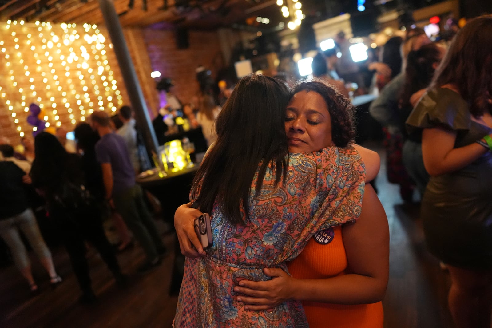 Supporters of Florida's Amendment 4, which would have enshrined abortion rights in the state, react after the amendment's defeat, during a watch party for the Yes On 4 campaign, on Election Day, Tuesday, Nov. 5, 2024, in St. Petersburg, Fla. (AP Photo/Rebecca Blackwell)