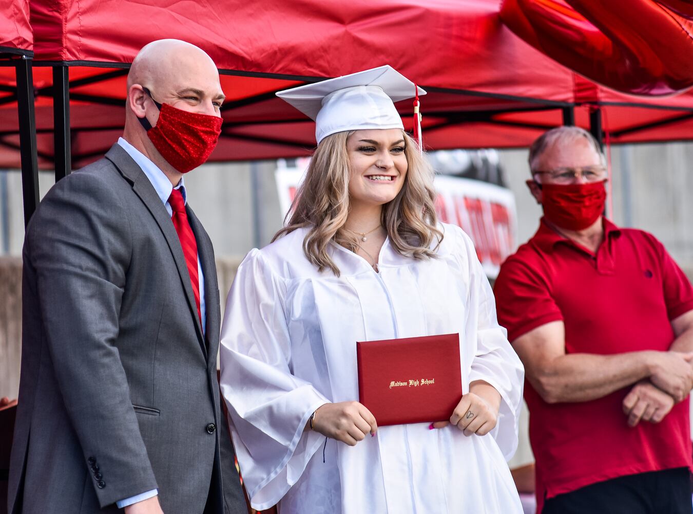 Madison High School drive-thru graduation ceremony at Land of Illusion