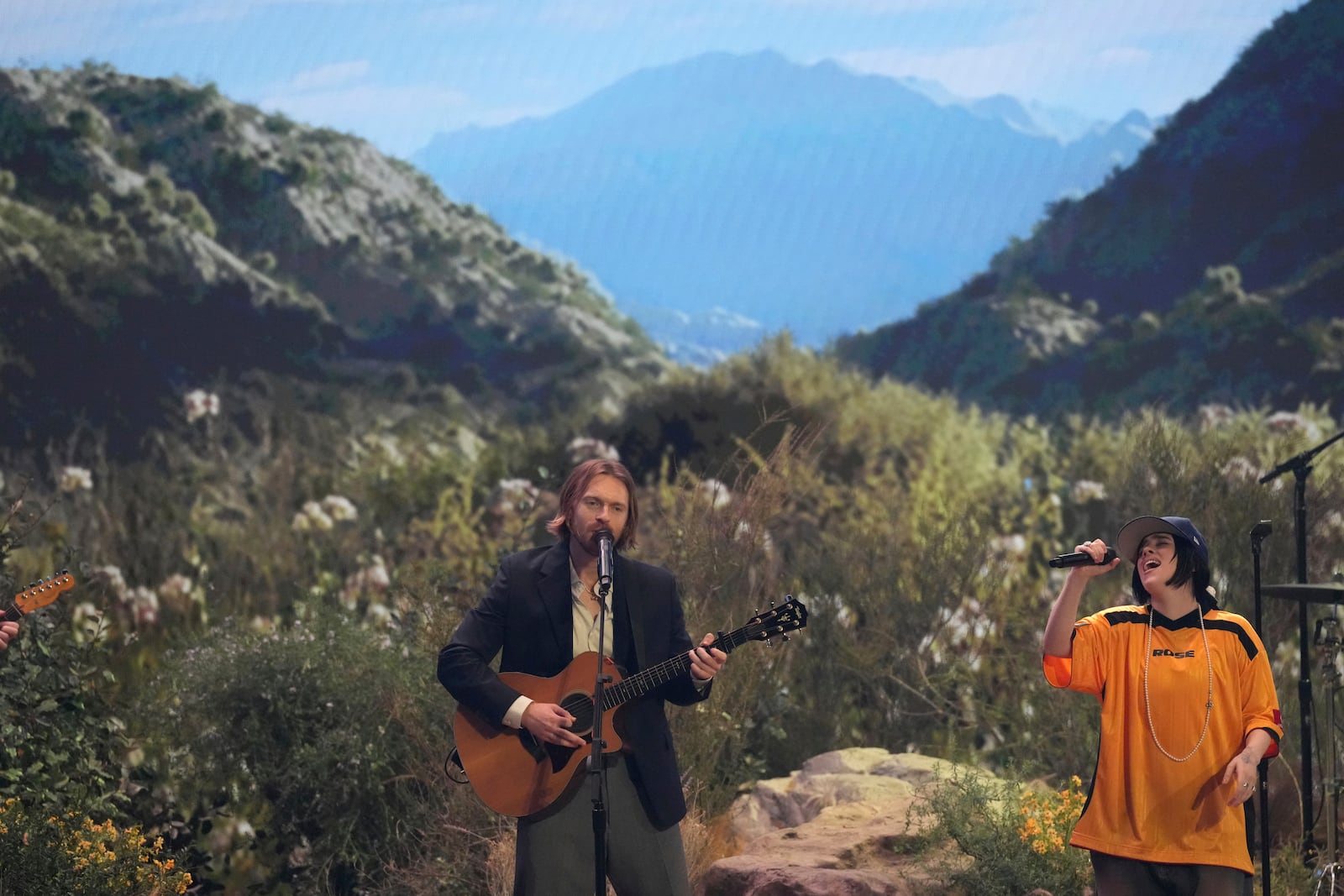 Finneas O'Connell, left, and Billie Eilish perform "Birds of a Feather" during the 67th annual Grammy Awards on Sunday, Feb. 2, 2025, in Los Angeles. (AP Photo/Chris Pizzello)