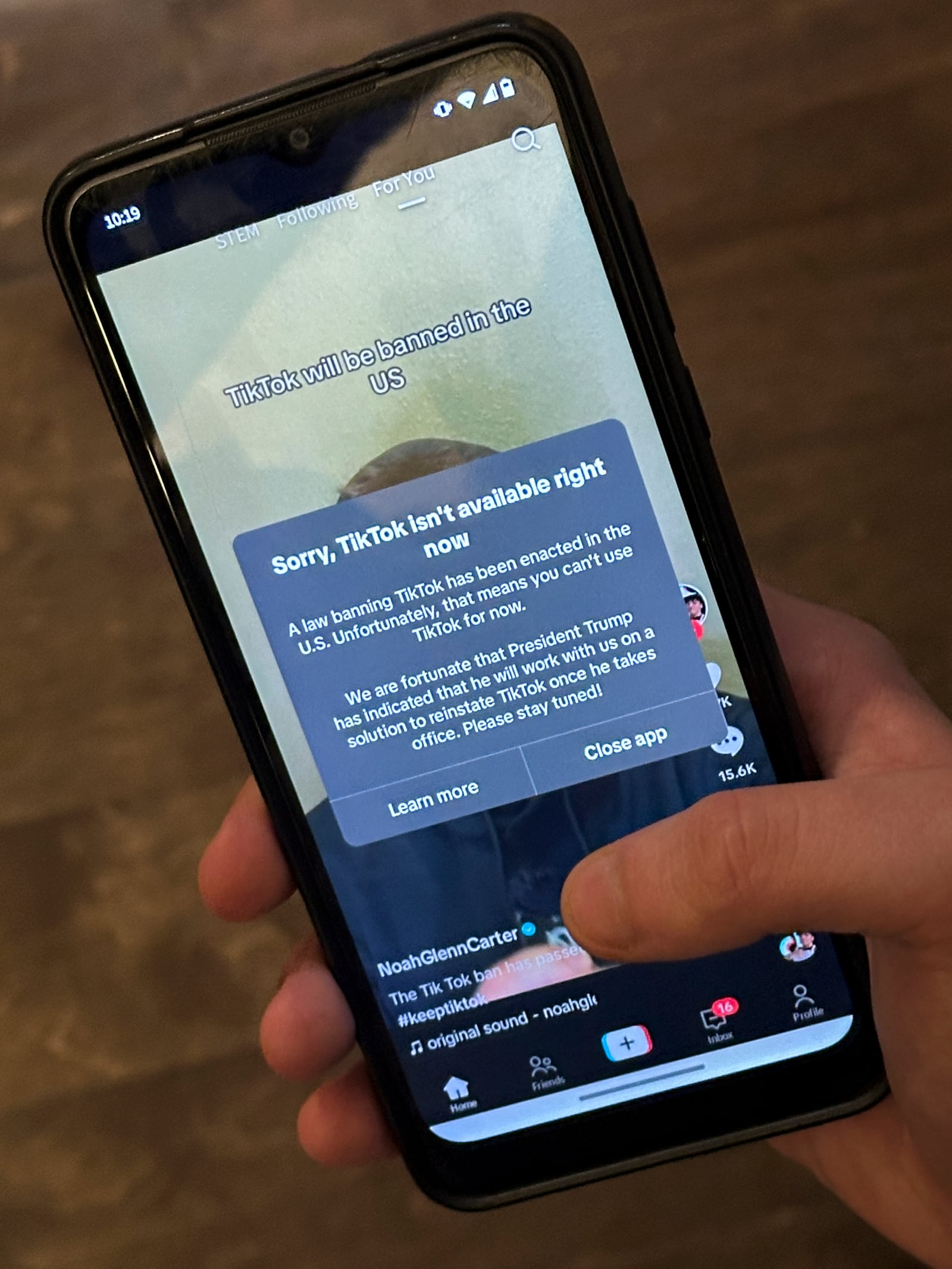 A message reading "Sorry, TikTok isn't available right now" is displayed from the TikTok app on a cell phone screen Saturday, Jan. 18, 2025, in Nashville, Tenn. (AP Photo/George Walker IV)