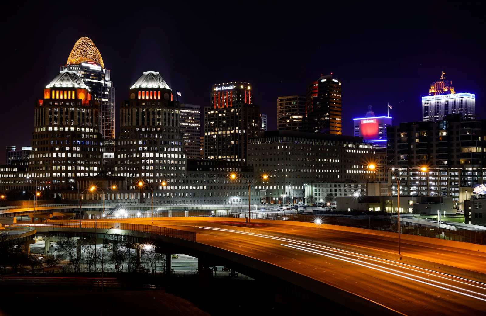 The glow of orange lights, signs, billboards and more were visible in Cincinnati early Tuesday, Feb. 1, 2022 in support of the Cincinnati Bengals making it to the Superbowl. NICK GRAHAM/STAFF