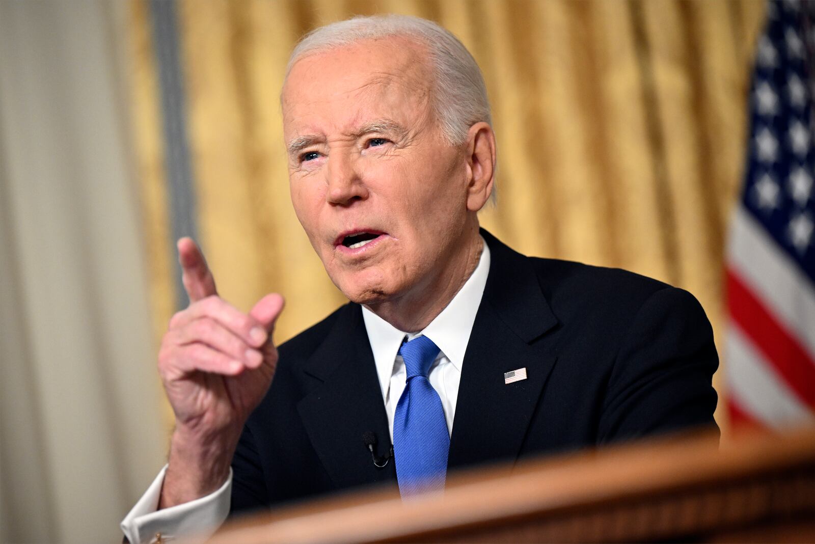 President Joe Biden speaks from the Oval Office of the White House as he gives his farewell address Wednesday, Jan. 15, 2025, in Washington. (Mandel Ngan/Pool via AP)