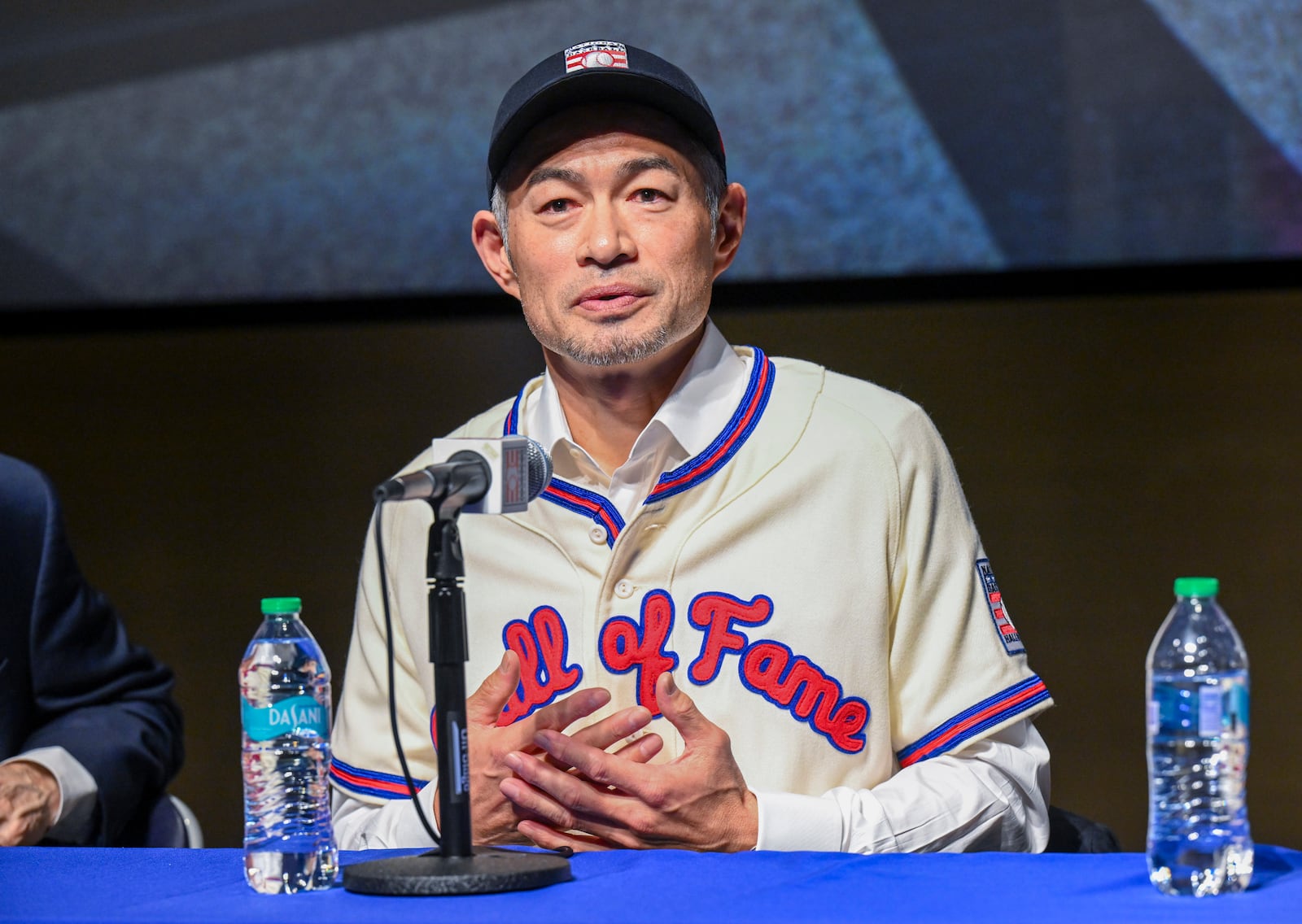 Newly-elected Baseball Hall of Fame inductee Ichiro Suzuki talks to reporters during a news conference Thursday, Jan. 23, 2025, in Cooperstown, N.Y. (AP Photo/Hans Pennink)