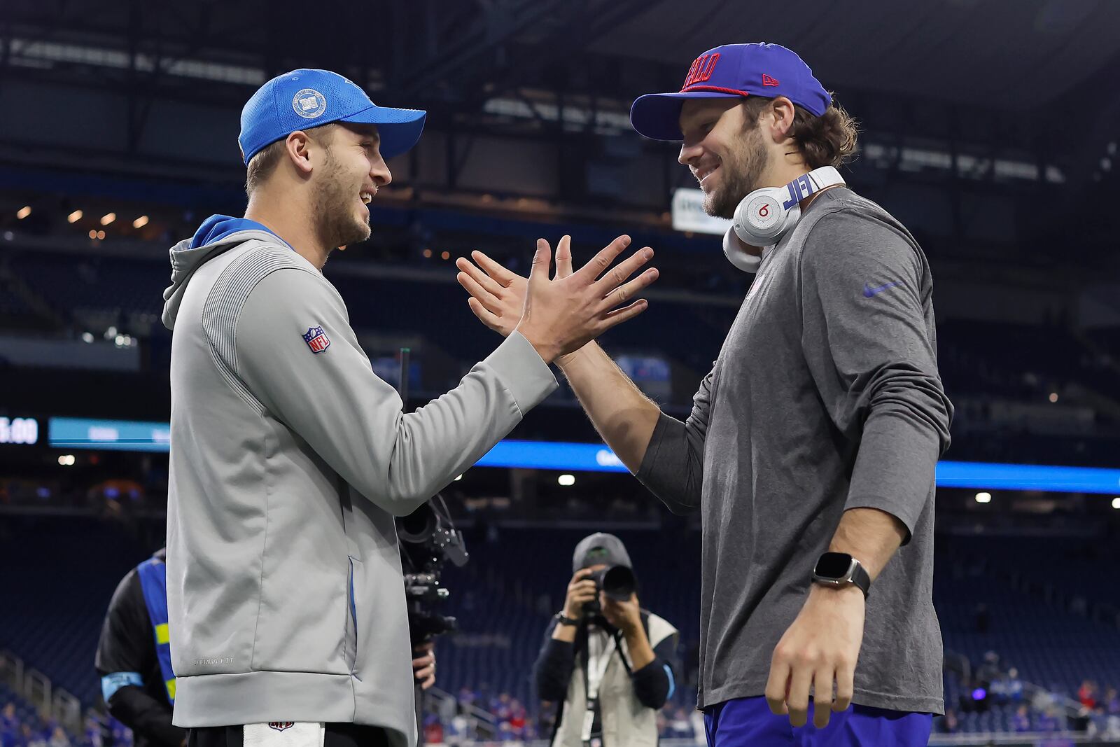 Detroit Lions quarterback Jared Goff, left, greets Buffalo Bills quarterback Josh Allen before an NFL football game on Sunday, Dec. 15, 2024, in Detroit. (AP Photo/Rey Del Rio)