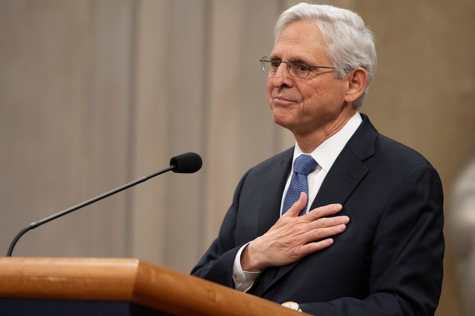 Attorney General Merrick Garland reacts during a farewell ceremony at the Department of Justice, Thursday, Jan. 16, 2025, in Washington. (AP Photo/Mark Schiefelbein)