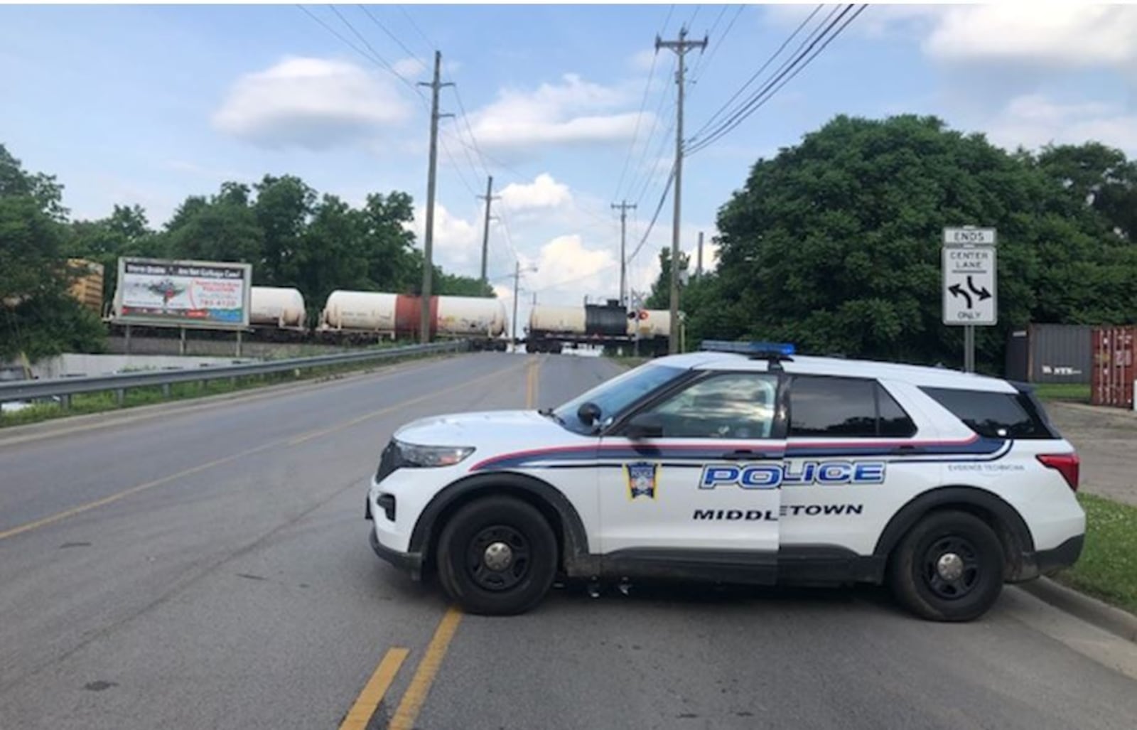 Andrew Smith, 33, of Middletown, was struck by a train and killed Monday morning on the tracks near Waneta Street in Middletown. Middletown police blocked roads near the railroad crossing for about 90 minutes during the investigation. RICK McCRABB/STAFF
