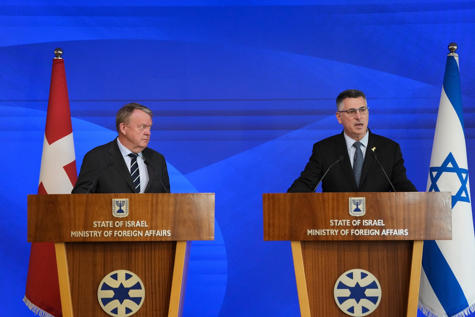 Israeli Foreign Minister Gideon Saar, right, and his Danish counterpart, Lars Lokke Rasmussen, speak to the media in Jerusalem on Monday, Jan 13, 2025. (AP Photo/Ohad Zwigenberg)