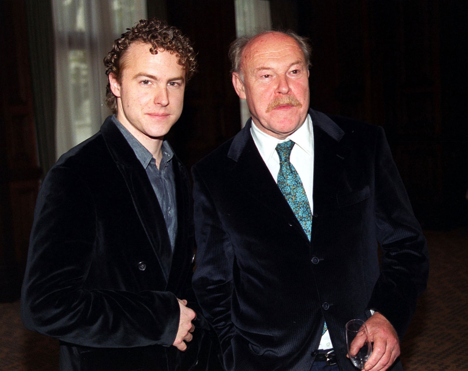 Timothy West and his son Sam West walk at The Talkies at The Landmark Hotel in central London, Nov. 12, 1999. (Stefan Rousseau/PA via AP)