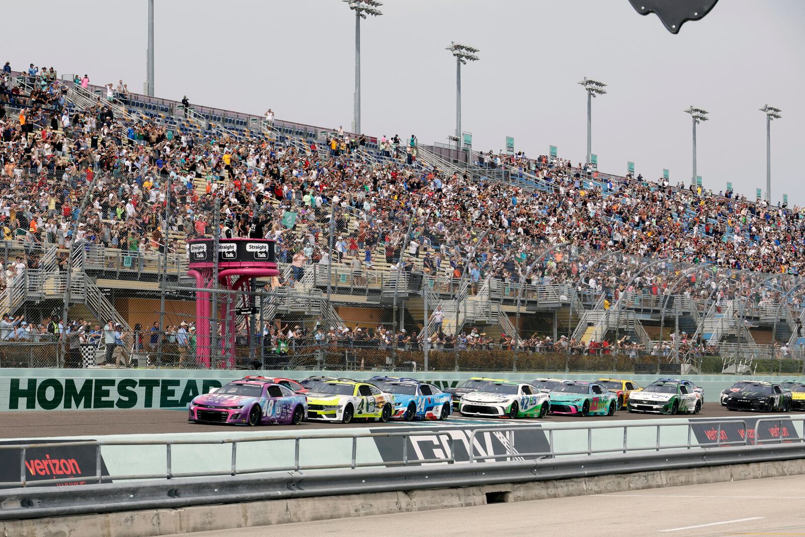 Alex Bowman (48) leads the field to start a NASCAR Cup Series auto race at Homestead-Miami Speedway in Homestead, Fla., Sunday, March 23, 2025.(AP Photo/Terry Renna)