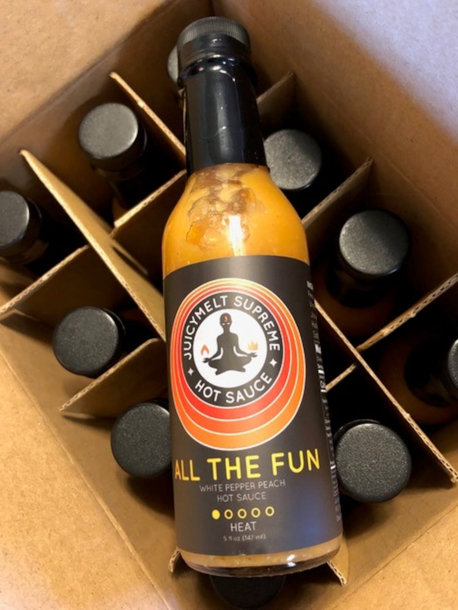 Tracy and Jeffrey McElfresh of Kettering have released JuicyMelt Supreme Hot Sauce.  Varieties include Ruby Wizard (grapefruit habanero), OG Catalyst (orange ginger habanero), and All the Fun (white pepper peach).