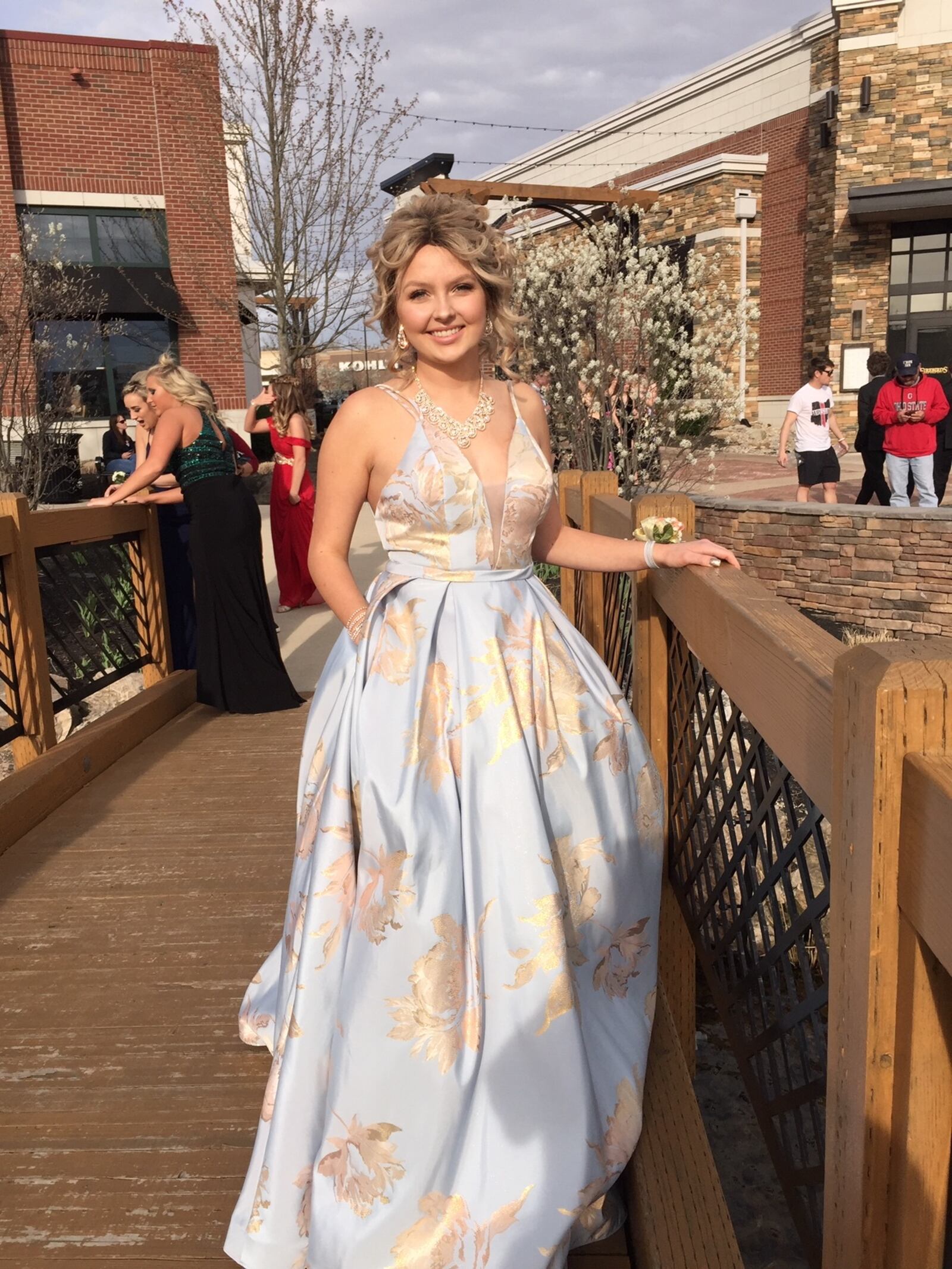 Mattie Cole, 16, a sophomore at Madison High School, is battling a rare form of bone cancer. Despite the chemotherapy treatments, Mattie went to her high school Prom Saturday night. She wore a wig for part of the evening, then took it off when it got hot and itchy, her mother said. SUBMITTED PHOTOS