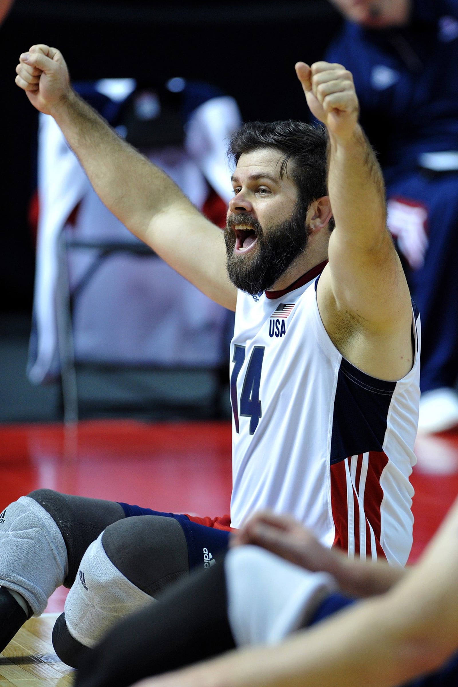 John Kremer, a member of the U.S. Men’s Sitting National Volleyball team,  celebrates at an international competition in 2017. He has competed around the world, including in the 2016 Olympics in Rio de Janeiro, Brazil. (Photo courtesy of USAVolleyball)