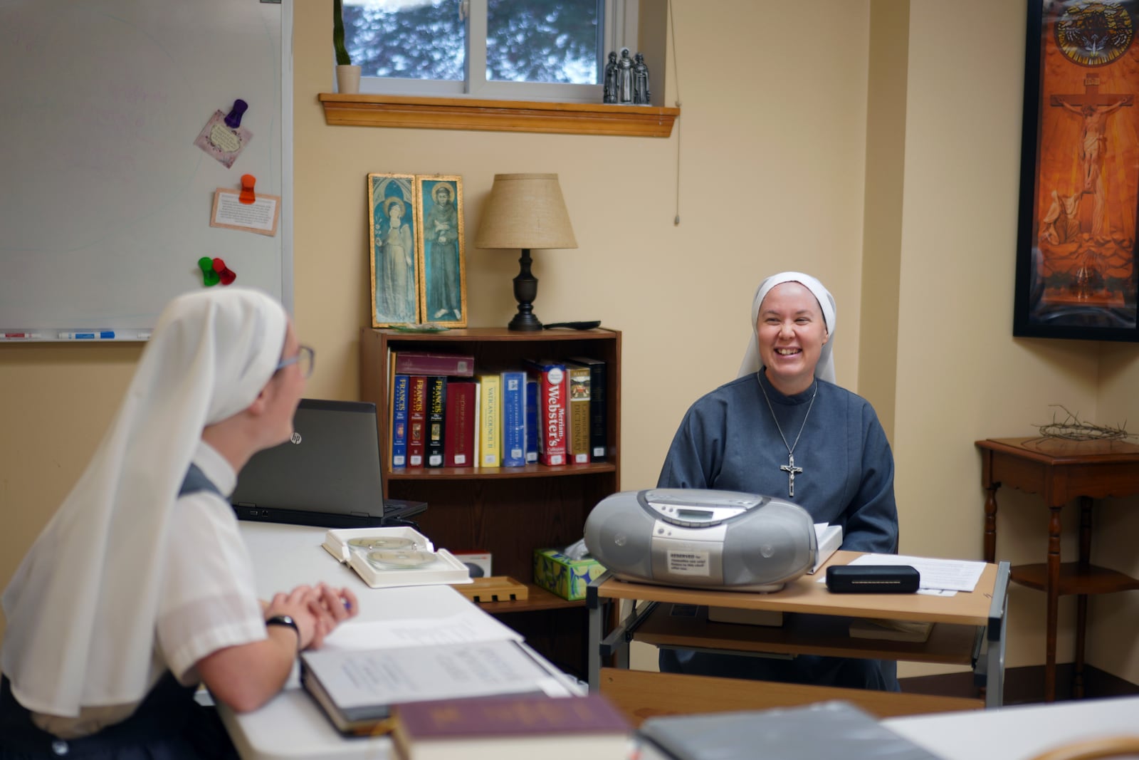 Sister Mary Gemma Harris, right, leads a class for novices at the motherhouse of the Franciscan Sisters, T.O.R. of Penance of the Sorrowful Mother, in Toronto, Ohio, Thursday, Nov. 7, 2024. (AP Photo/Jessie Wardarski)