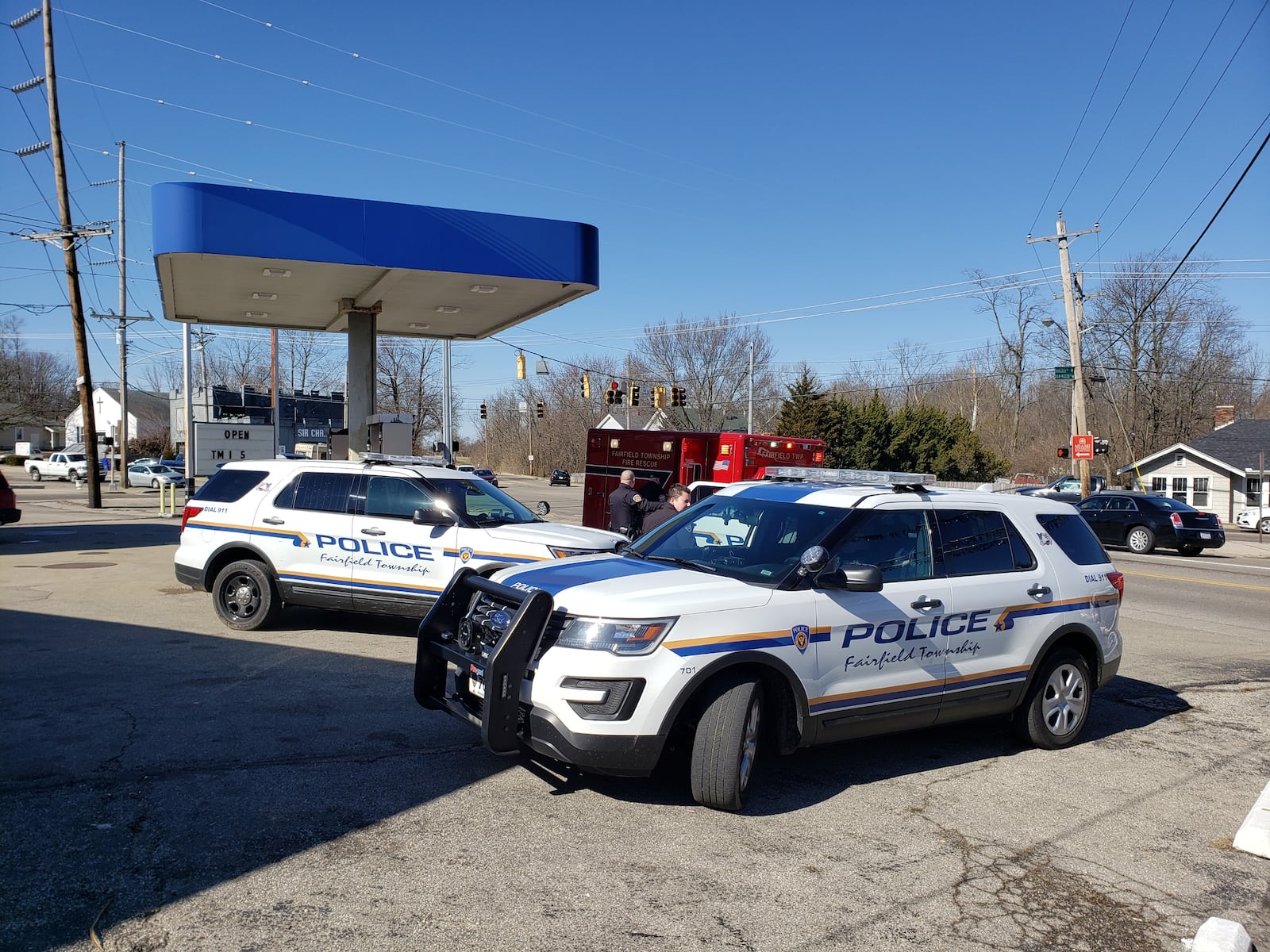 Fairfield Twp. police are parked in a gas station parking lot in the five points area of the township after they chased and apprehended a man with an active warrant. NICK GRAHAM/STAFF