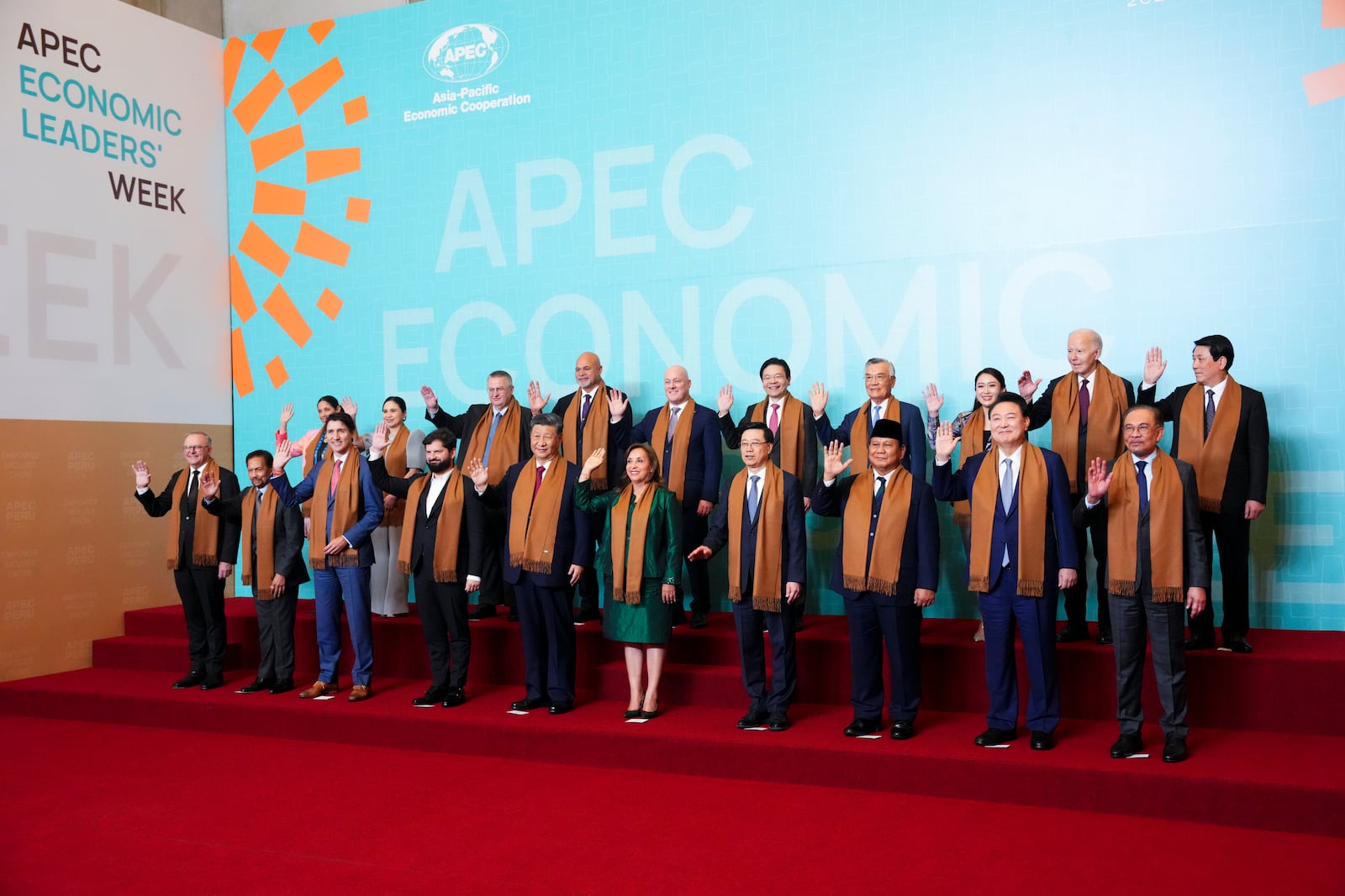 Prime Minister Justin Trudeau, third from front left, takes part a family photo during the APEC summit in Lima, Peru on Saturday, Nov. 16, 2024. (Sean Kilpatrick/The Canadian Press via AP)